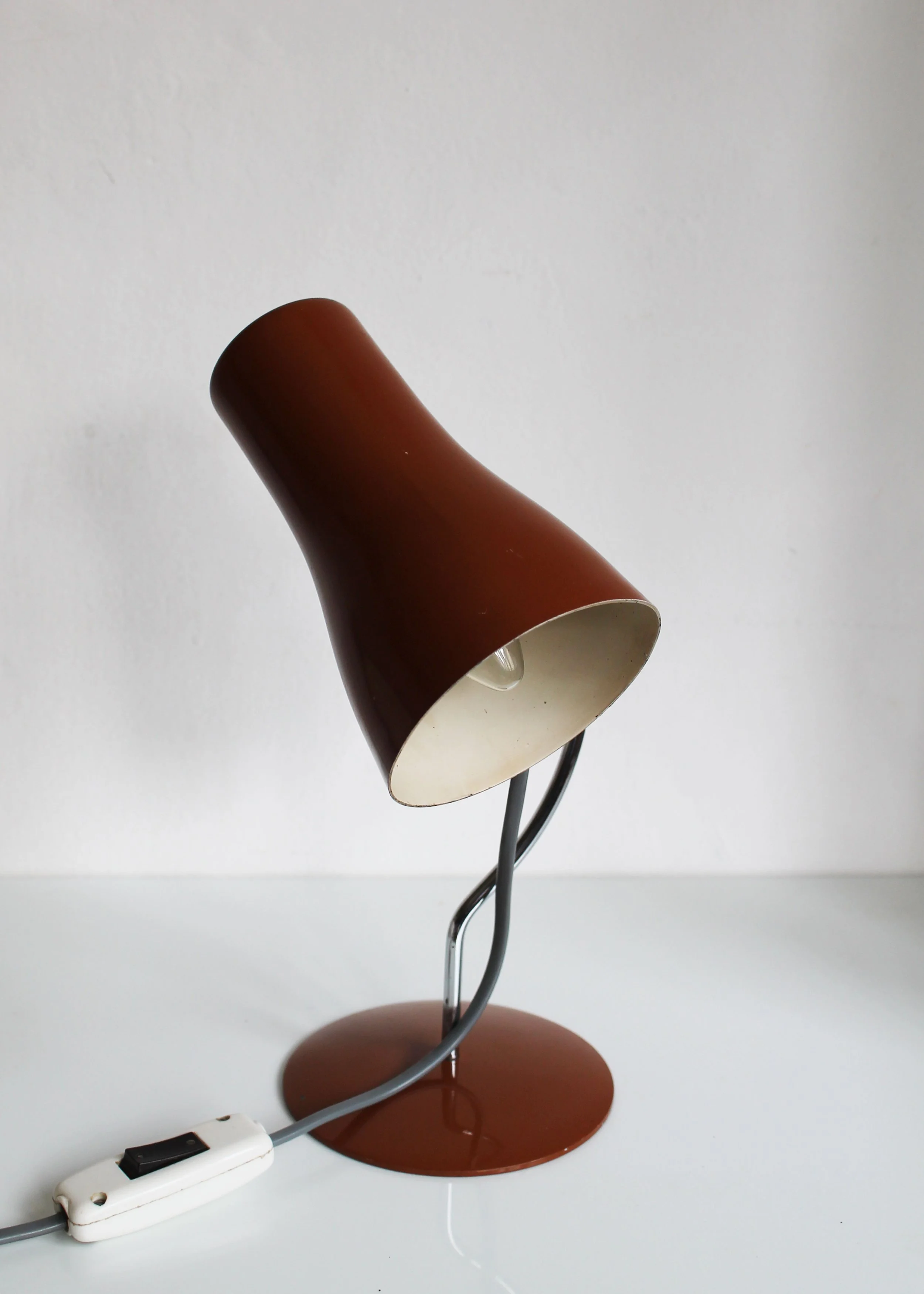 Original switch on top of lampshade Napako desk lamp 1960s.jpg