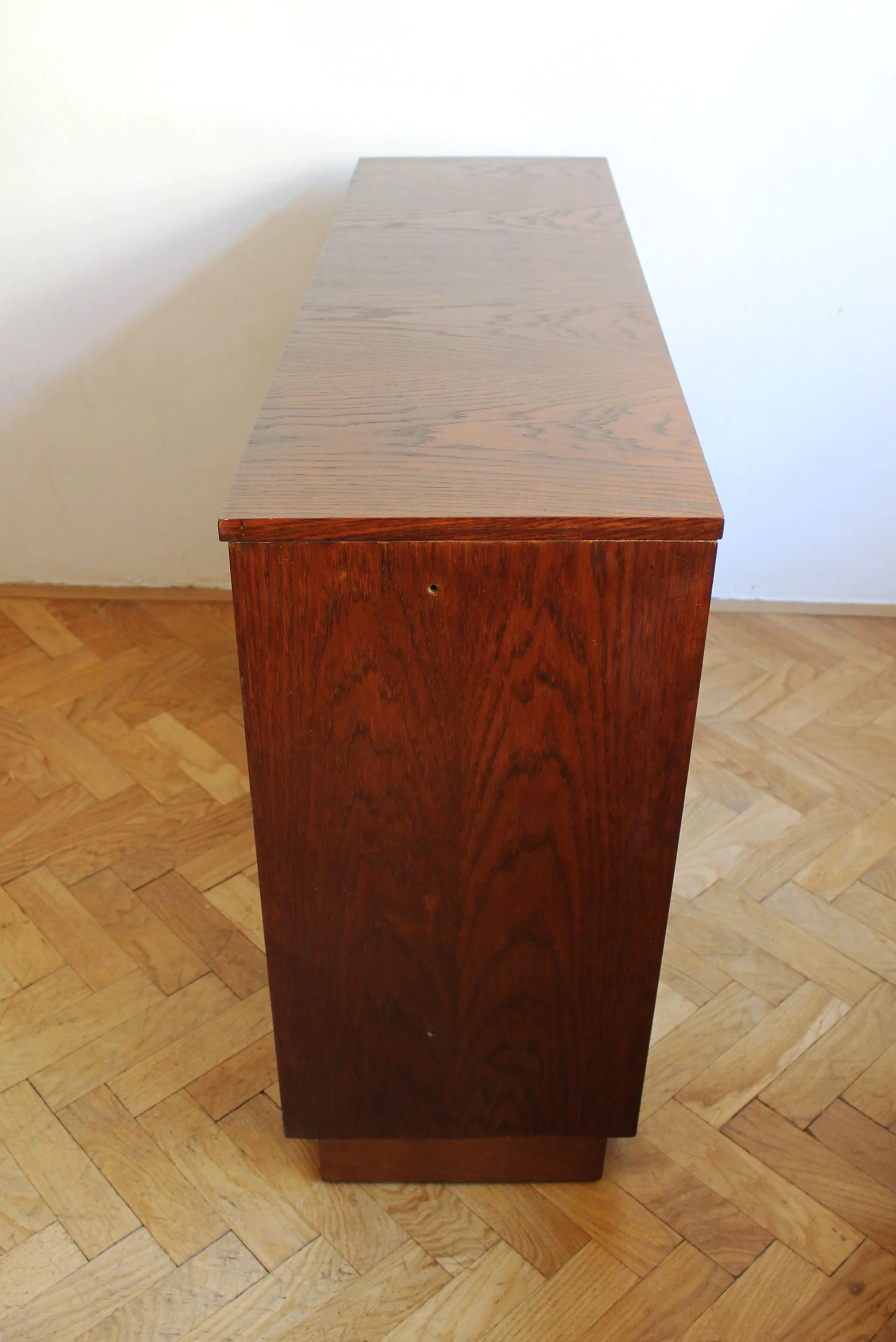 Rear three-quarter view of 1966 UP Závody narrow oak sideboard.jpg