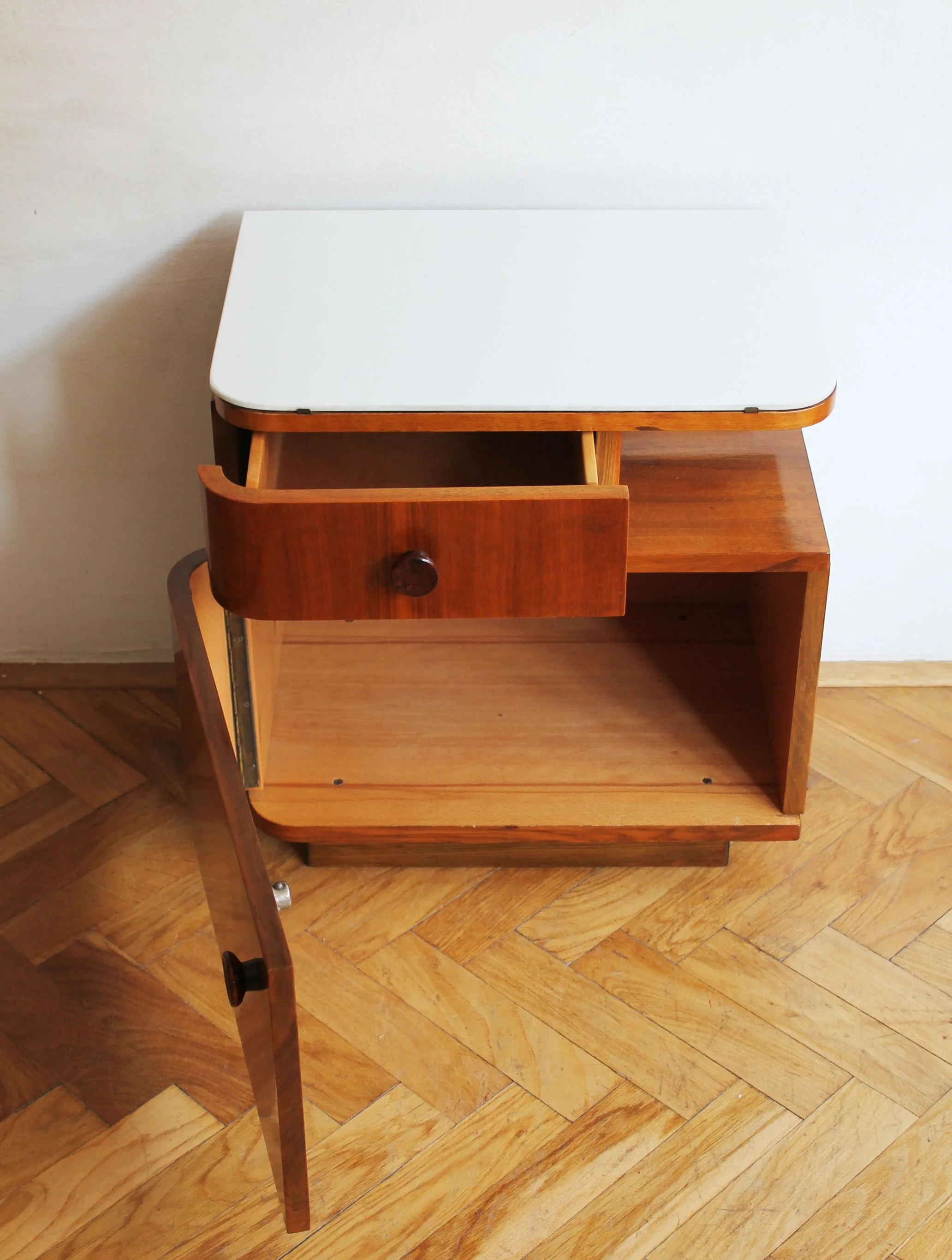 vintage 1950s nightstands with dark round handles.jpg