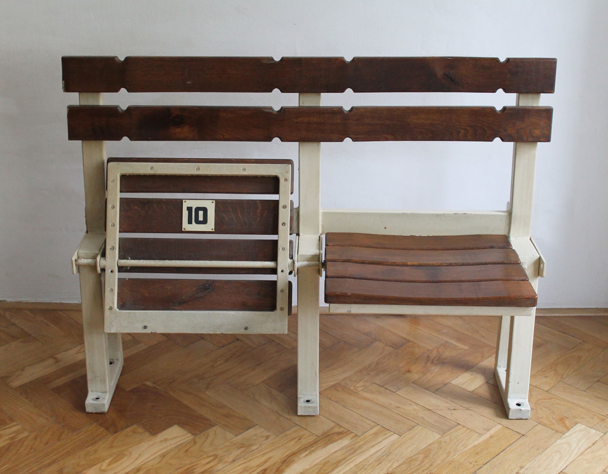Original numbered seats 10 and 11 from a 1970s Vodova Sports Hall bench in Brno