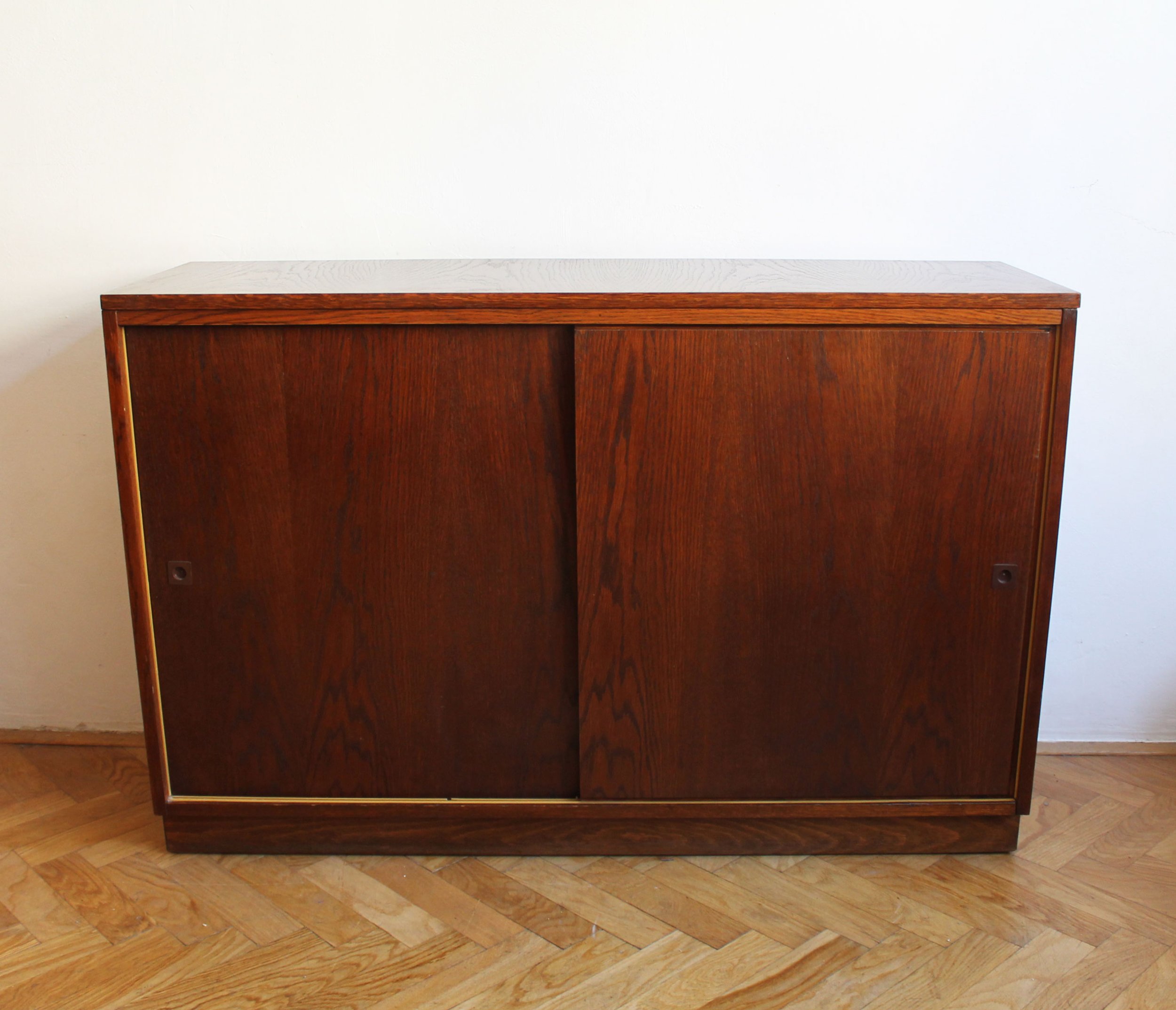 Front view of Czechoslovak Mid-Century oak sideboard with two sliding cabinet doors.jpg