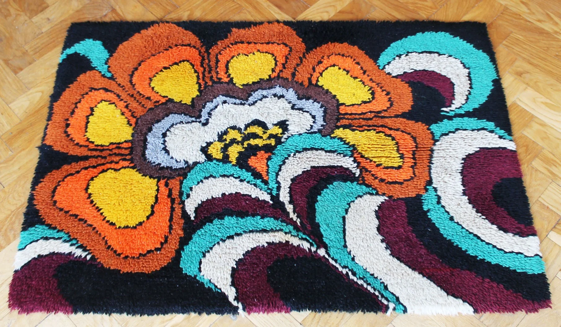Bright multicoloured 1970s rug for retro interior styling.jpg