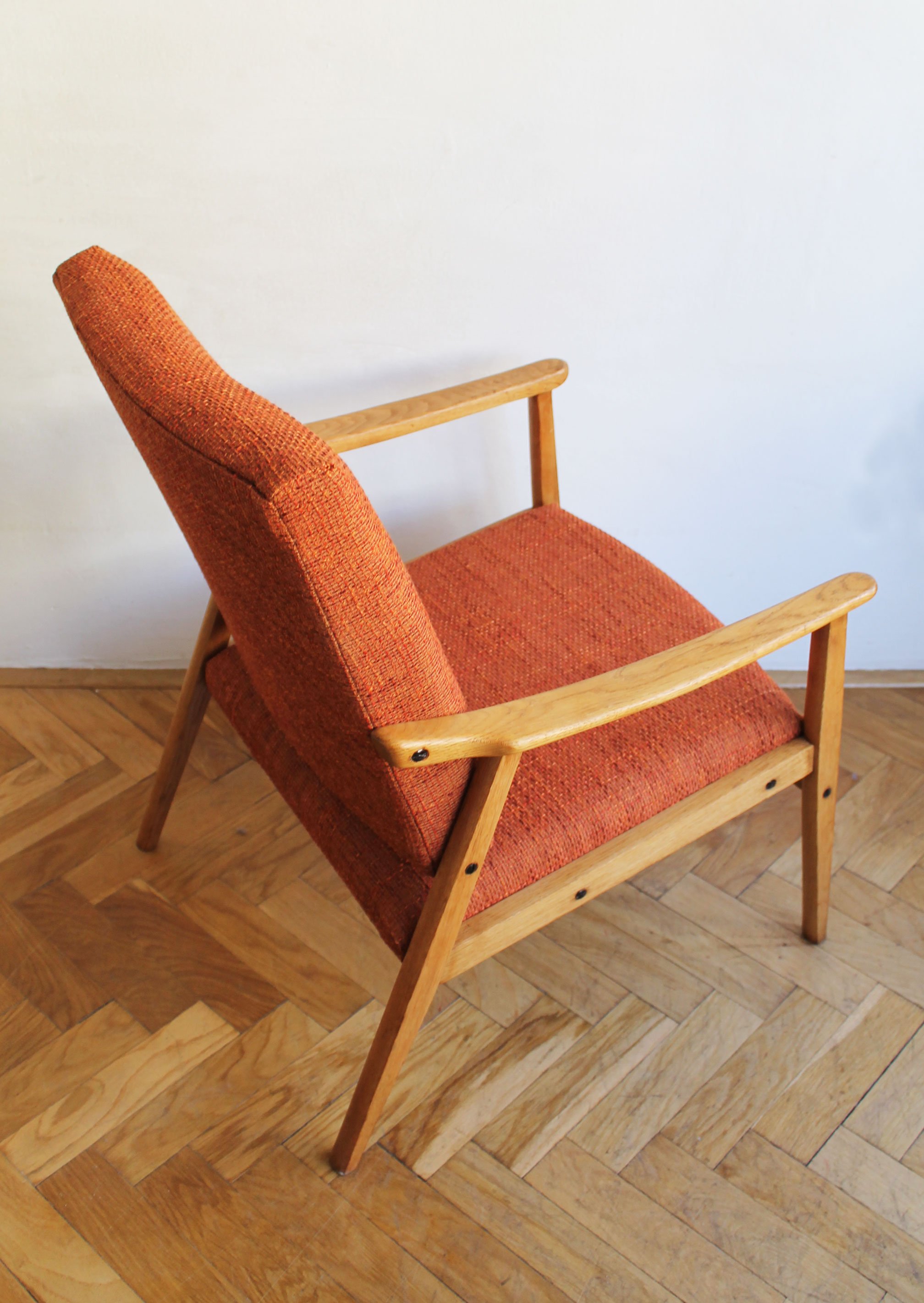 Vintage armchair showing clean Scandinavian-inspired lines.jpg