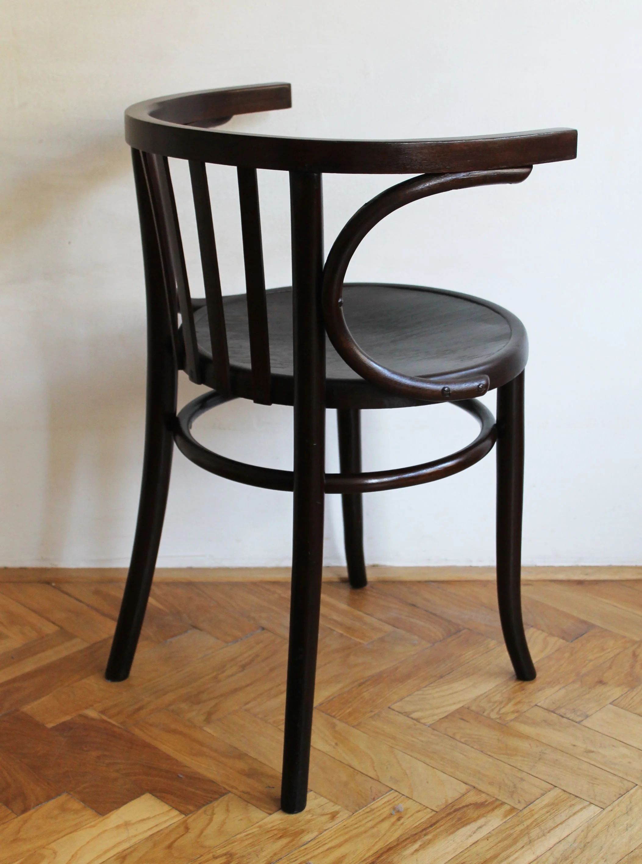 kia – Bernkop design  Restored vintage chair with arched legs and circular seat – Czech craftsmanship.jpg