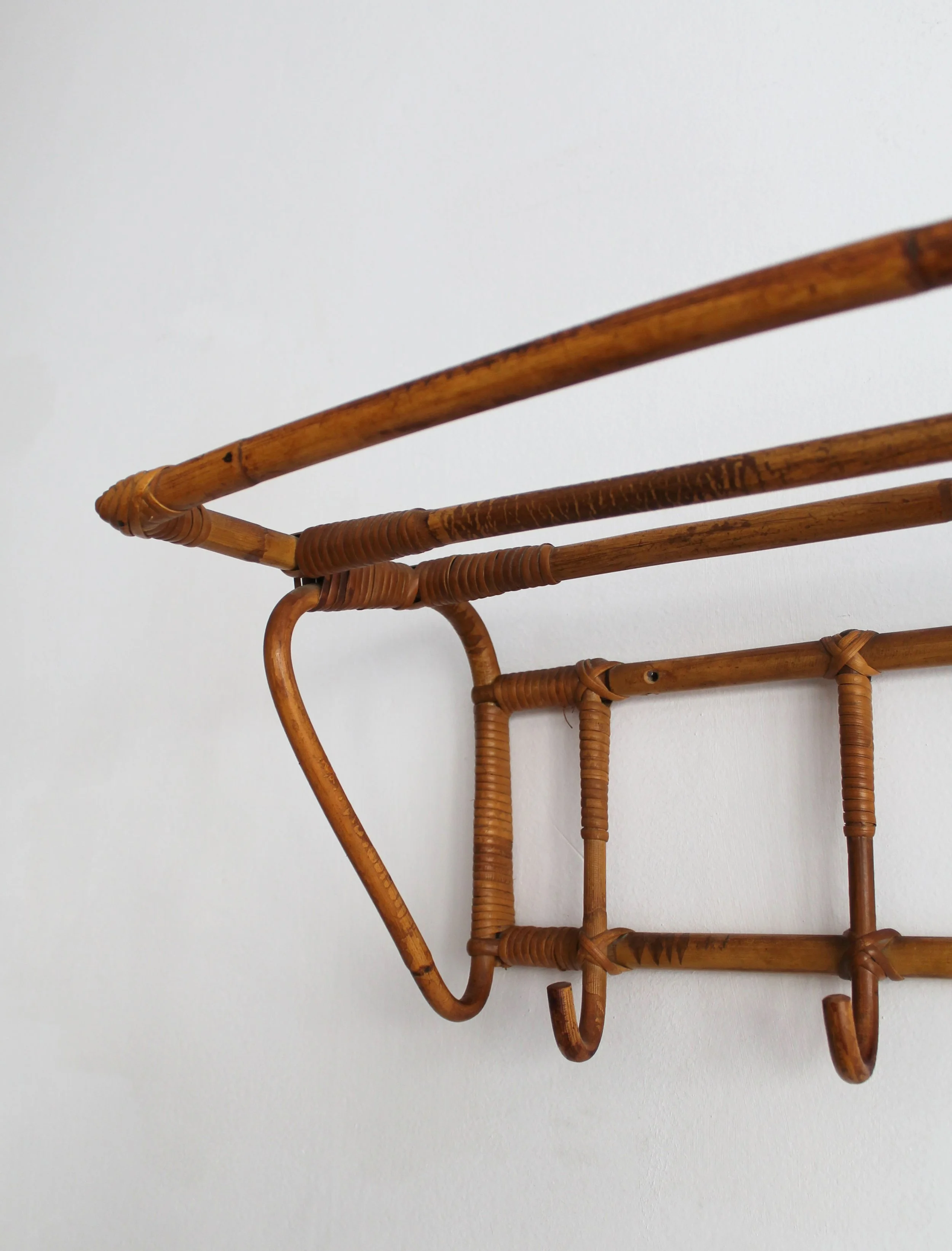 Wicker binding and bent cane construction detail on ÚLUV attributed coat rack.jpg