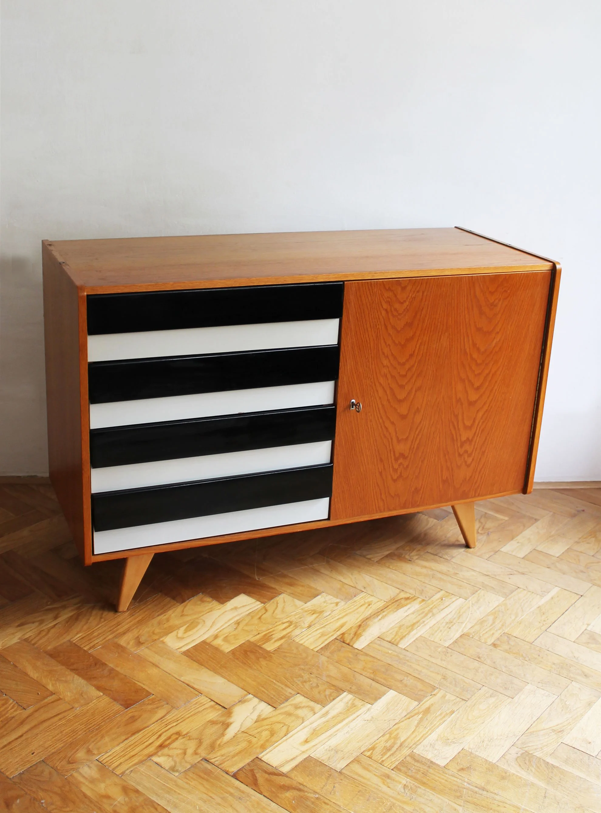 Black and white Formica drawer fronts on Jiří Jiroutek sideboard.jpg