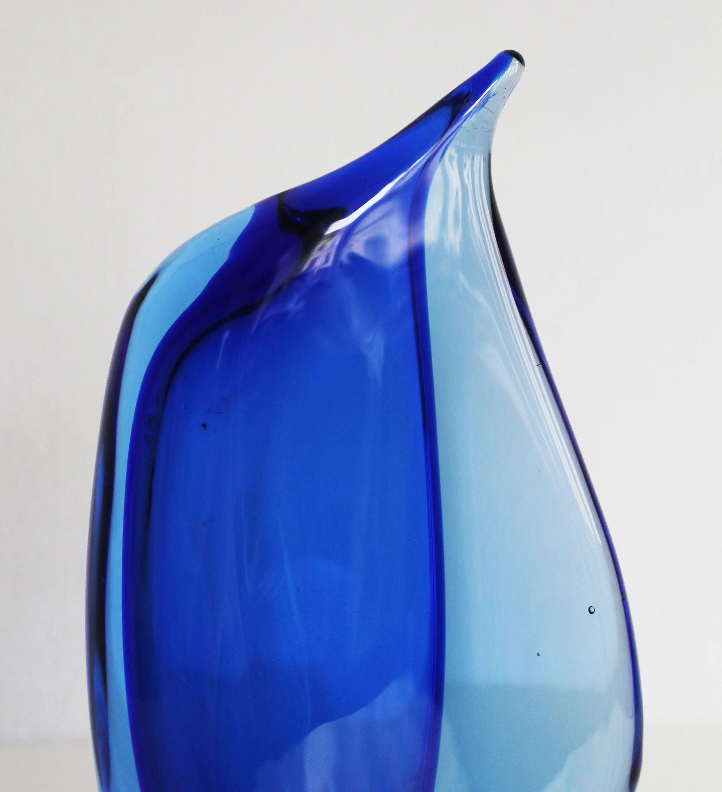 Mid-century European vase with flowing sculptural lines.jpg