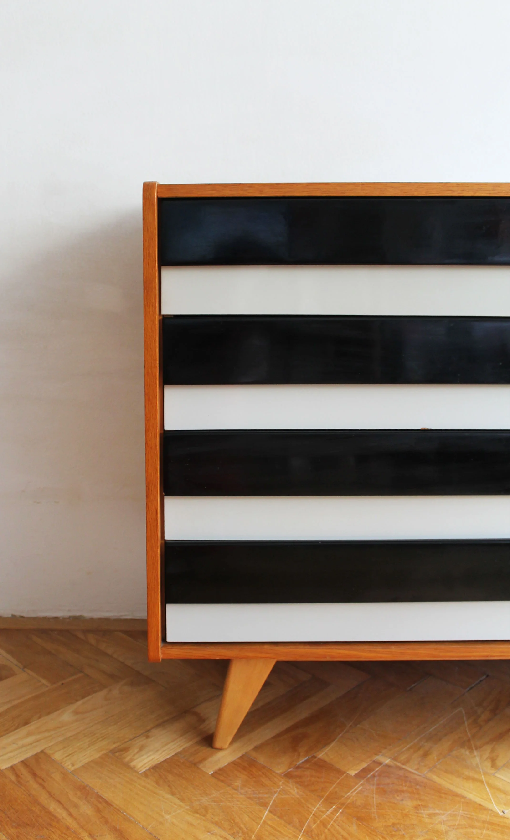Black and white Formica drawer fronts on Jiří Jiroutek sideboard.jpg