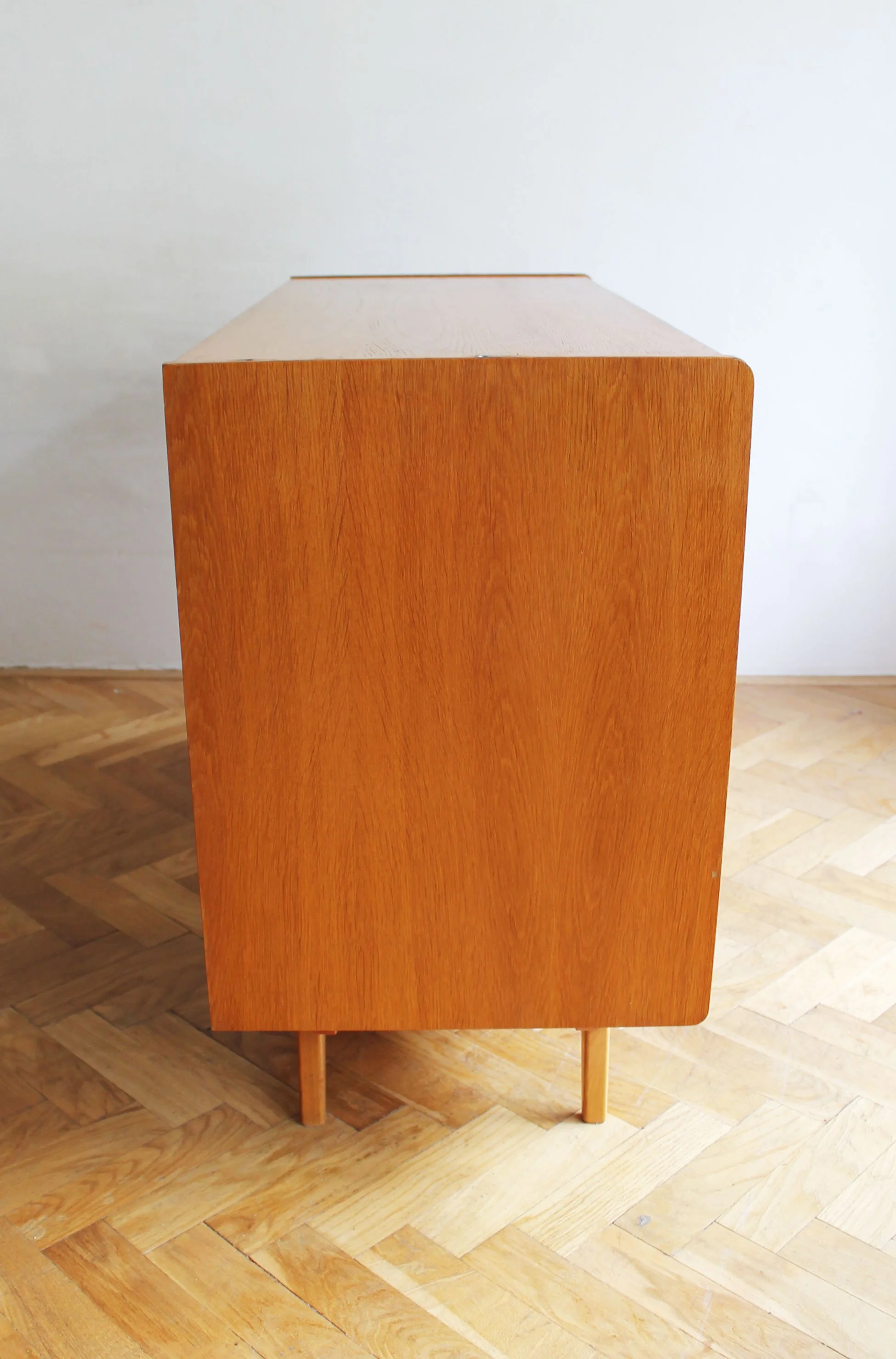 Side profile of the original Jiří Jiroutek sideboard.jpg
