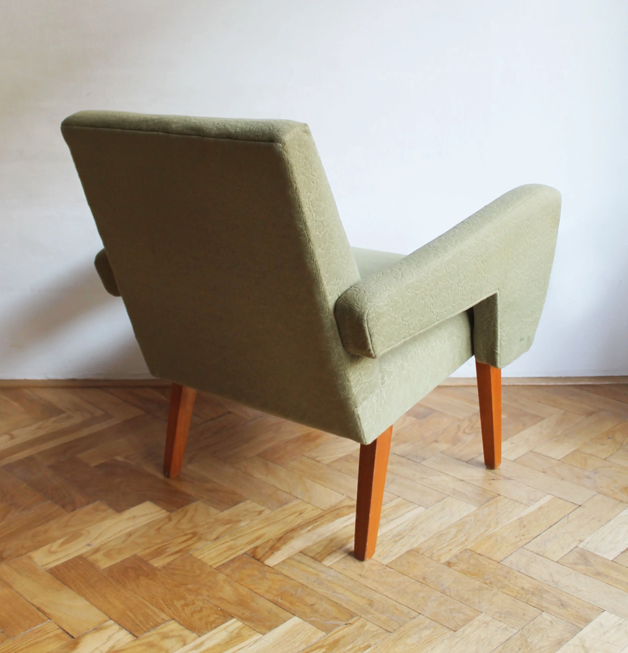 Jitona armchair detail showing solid beech construction.jpg