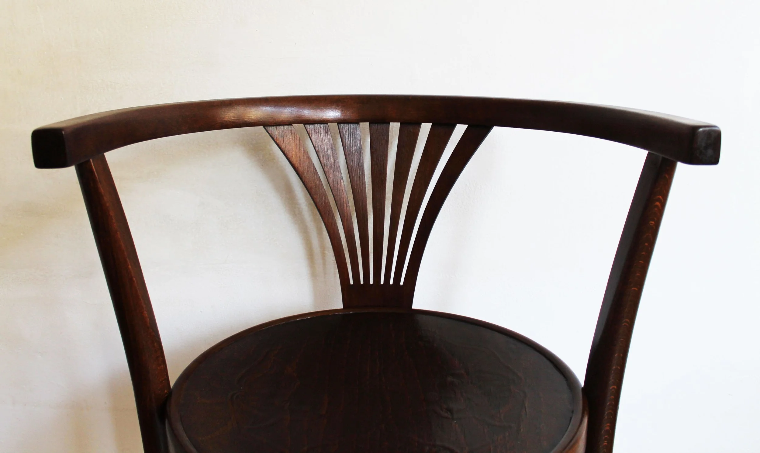 Vintage European bentwood seating, restored Art Nouveau craftsmanship.jpg