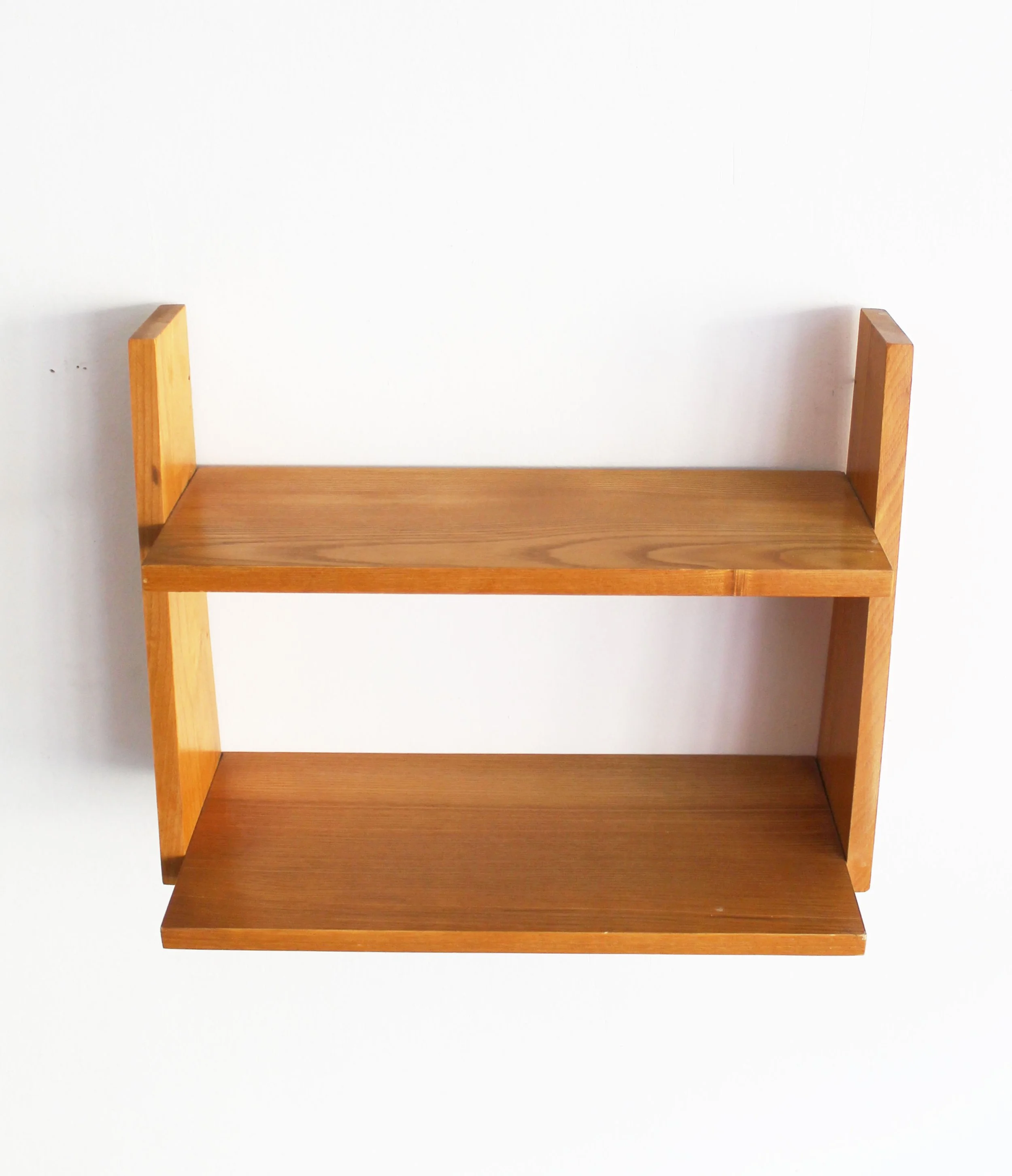 Upper view of 1960s mid-century beech wall shelf showing natural wood grain and two shelves
