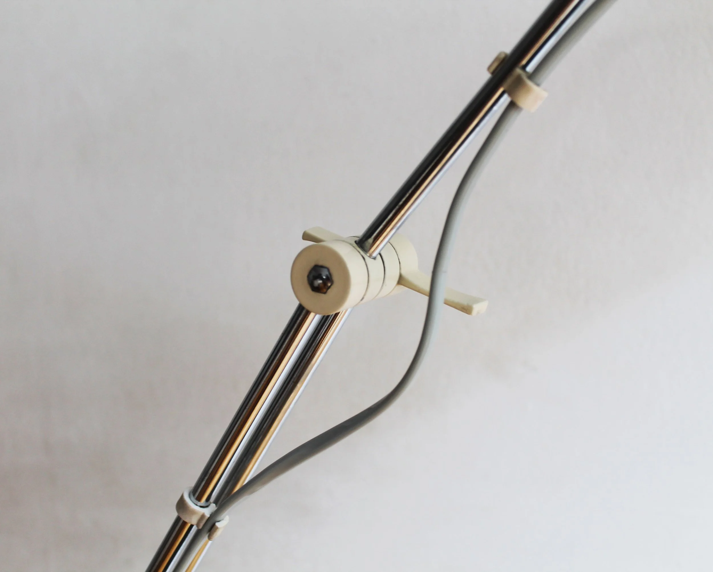 Detail of hinge mechanism connecting lamp head and arm