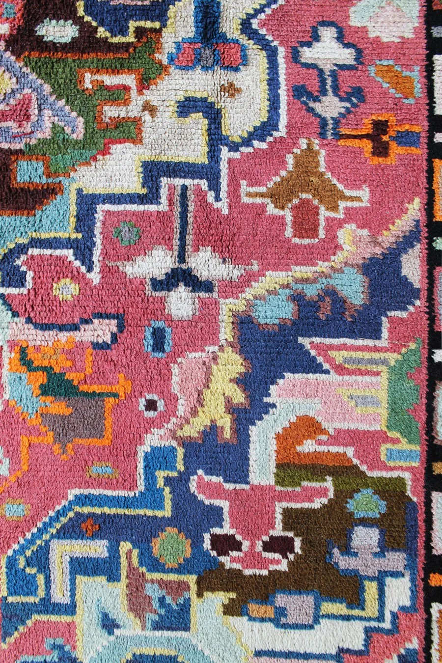 Retro 1960s wool rug in pink, blue, and multicolour geometry.jpg