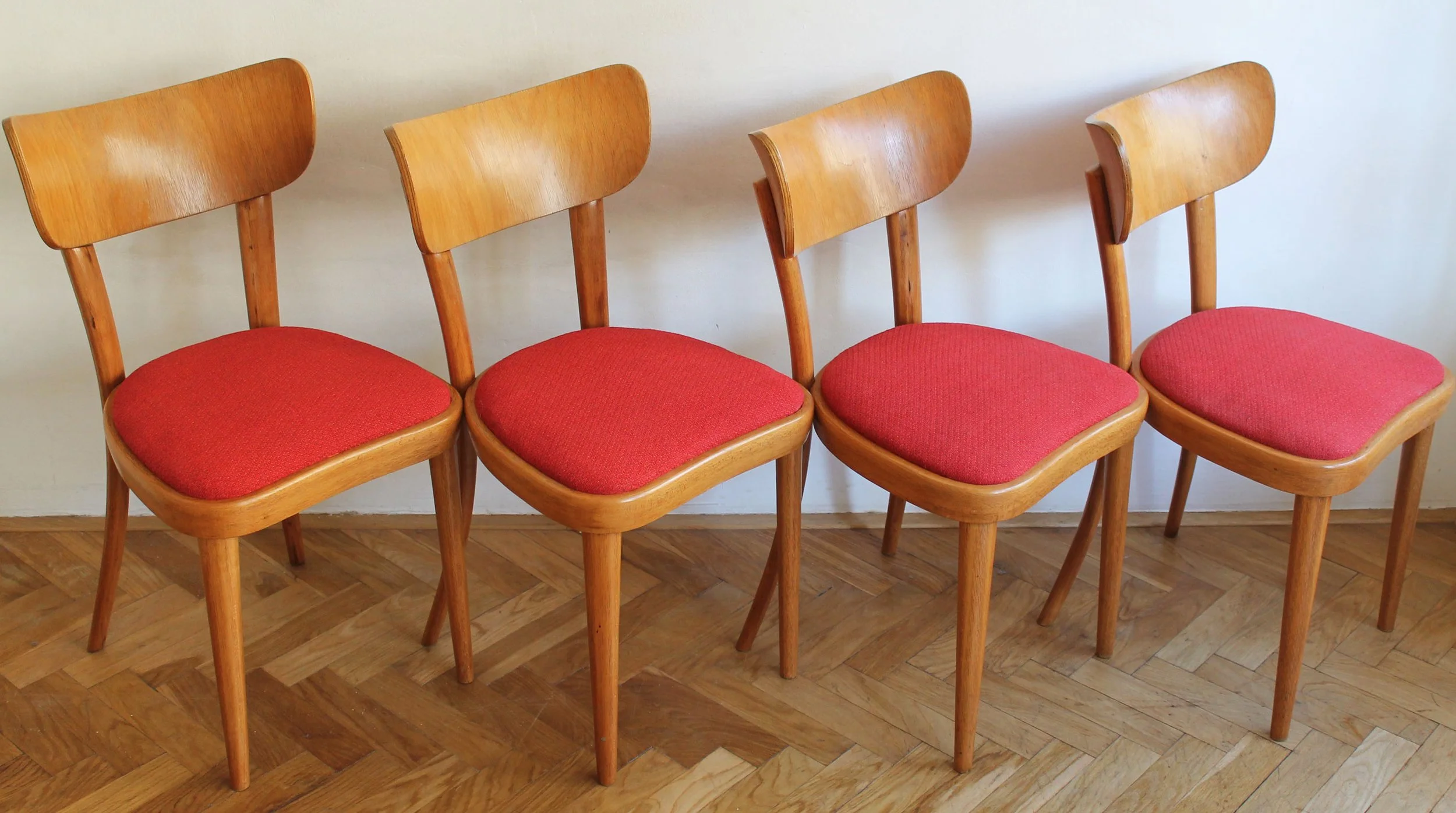 Vintage Thonet chairs in honey beech wood, side view.jpg
