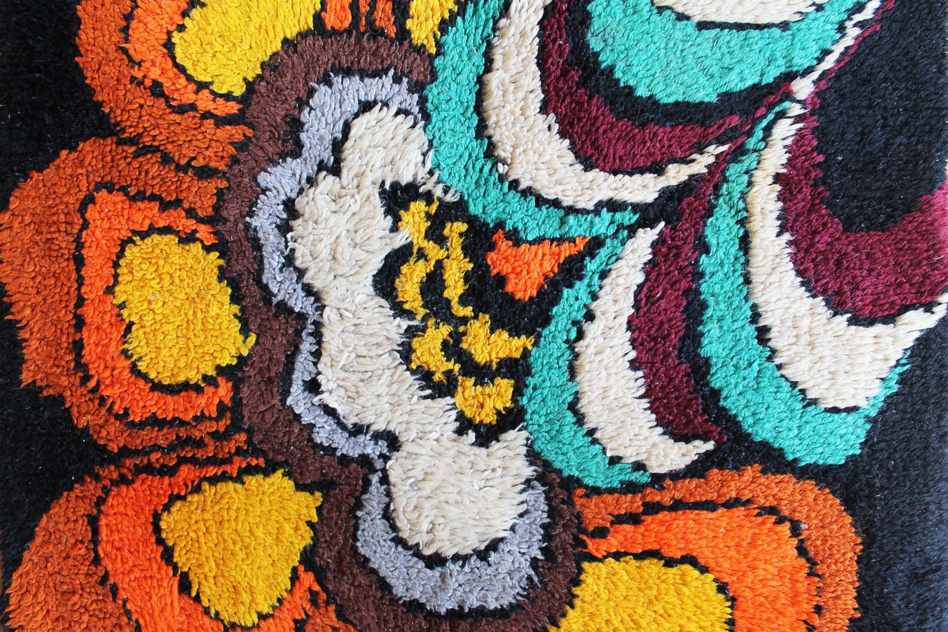 Bright multicoloured 1970s rug for retro interior styling.jpg