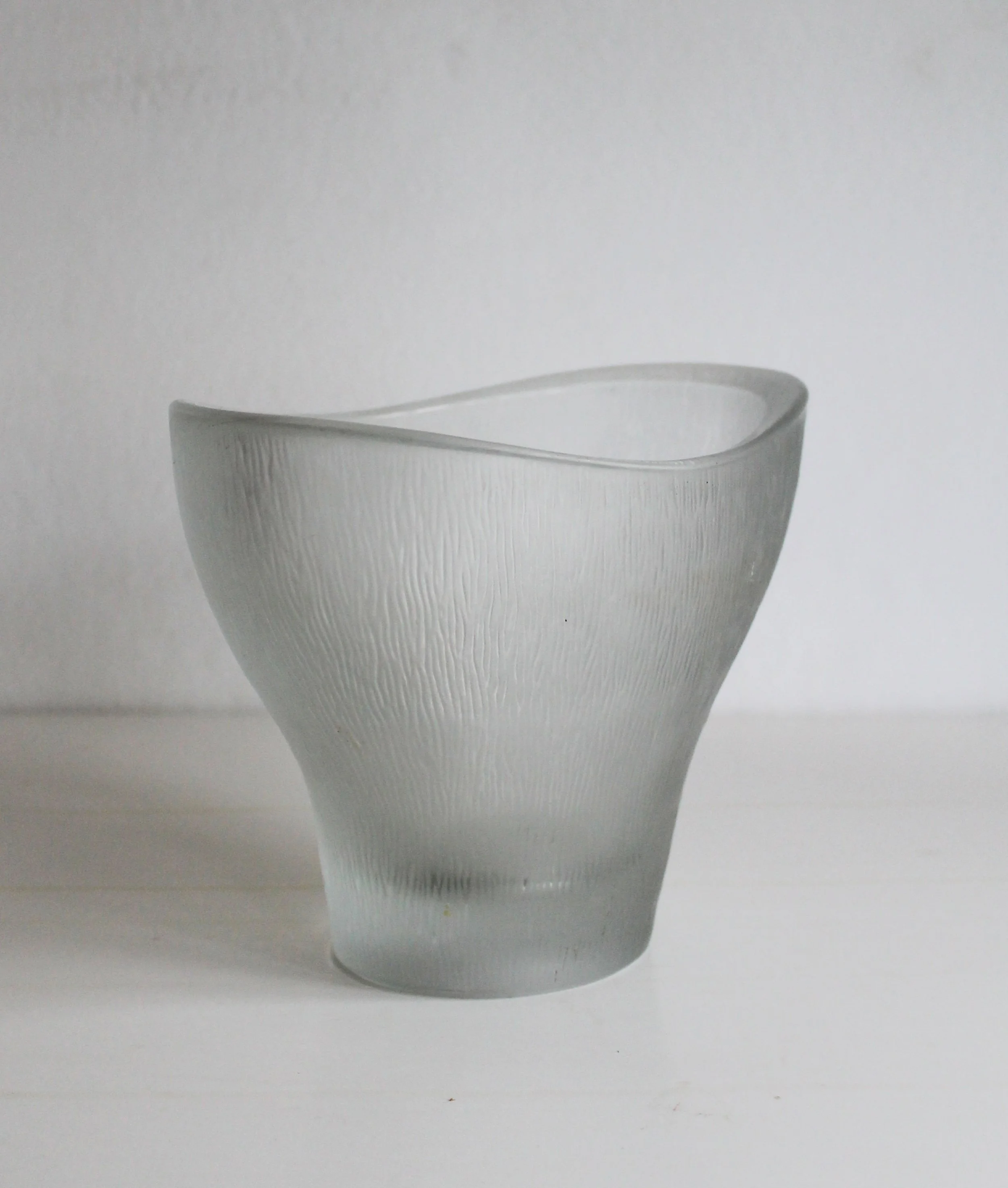 Pressed crystal bowl by Vízner under natural light revealing texture.jpg