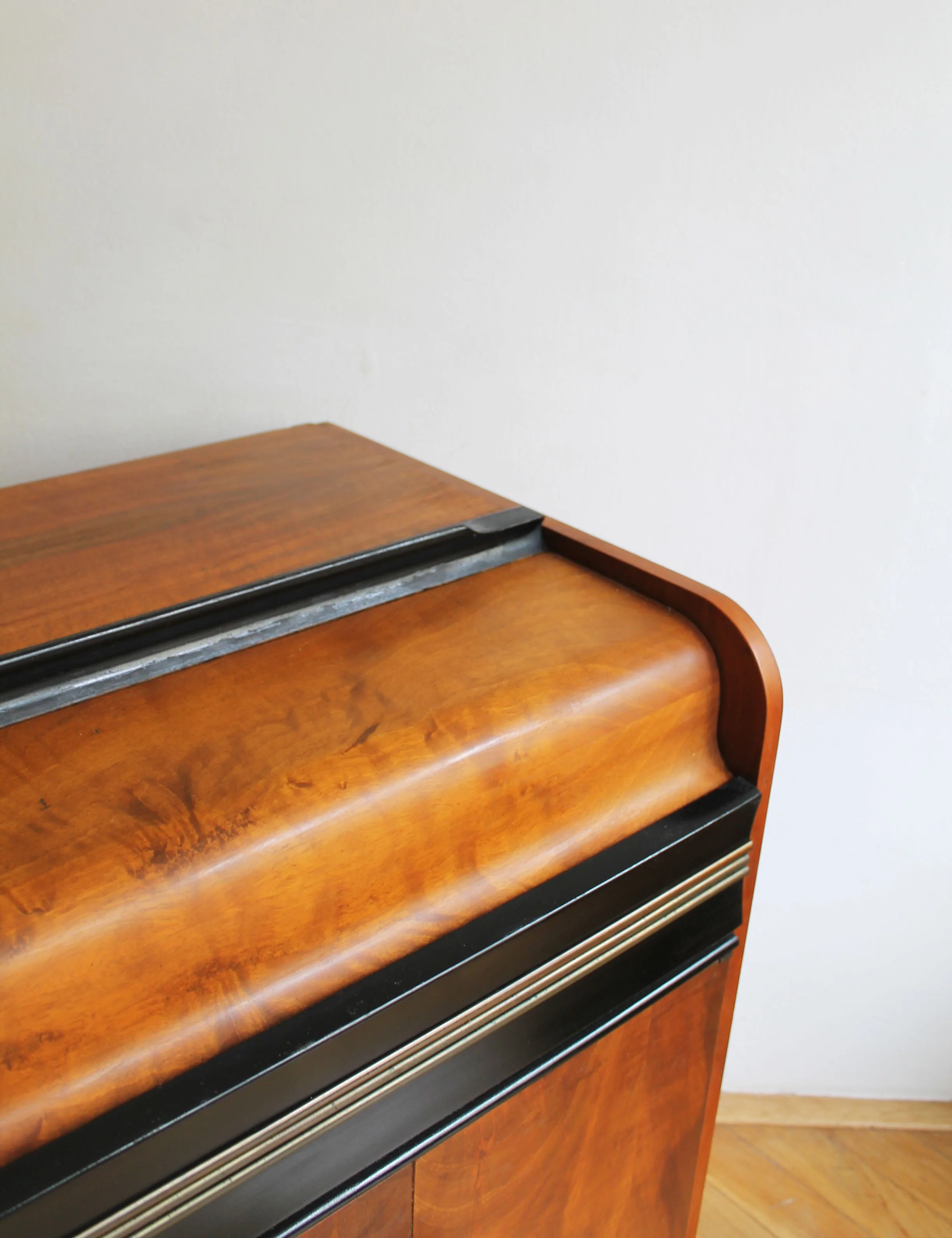 detail of walnut veneer mid century cabinet.jpg