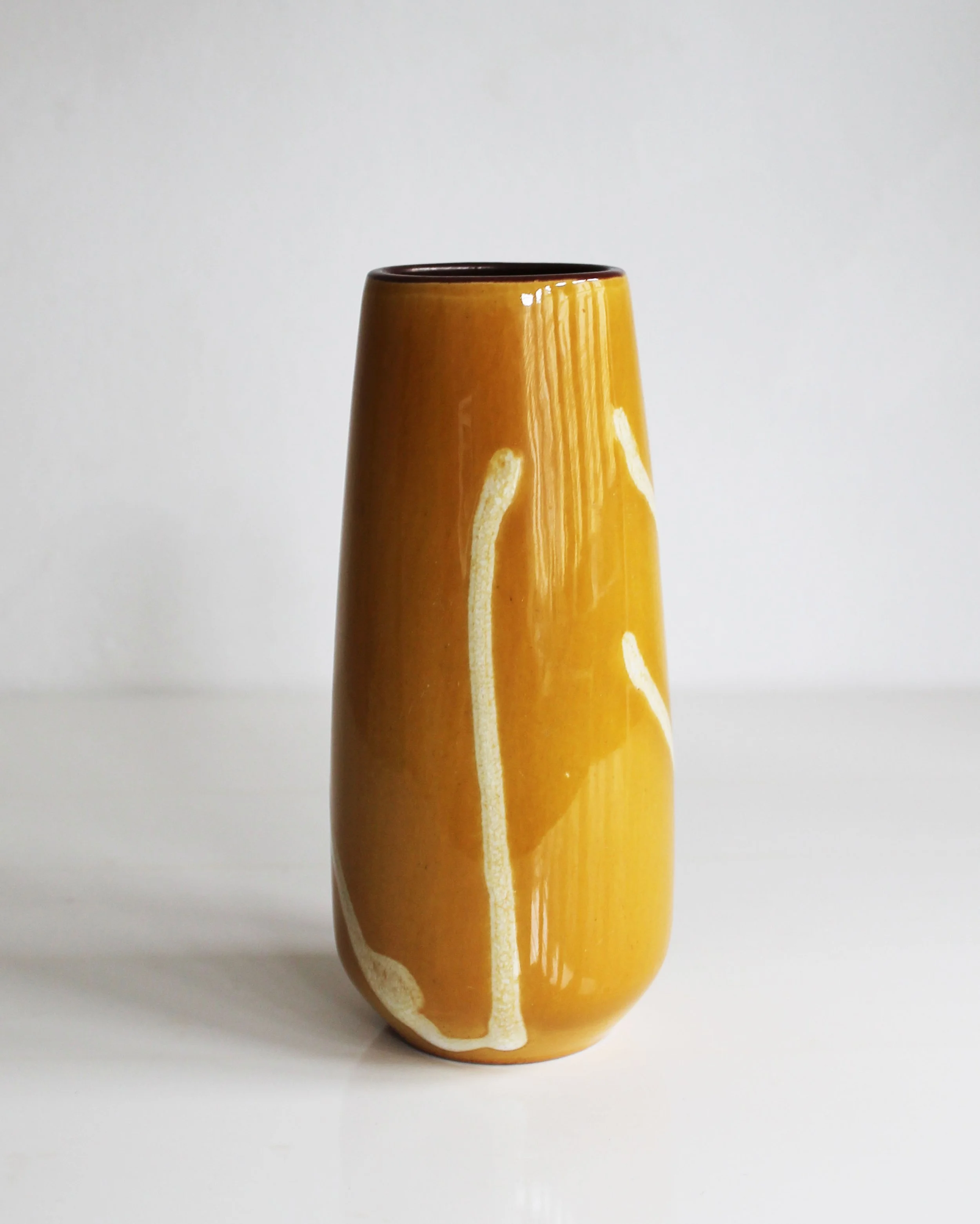 Angled view highlighting the vase’s shape and decorative details.jpg