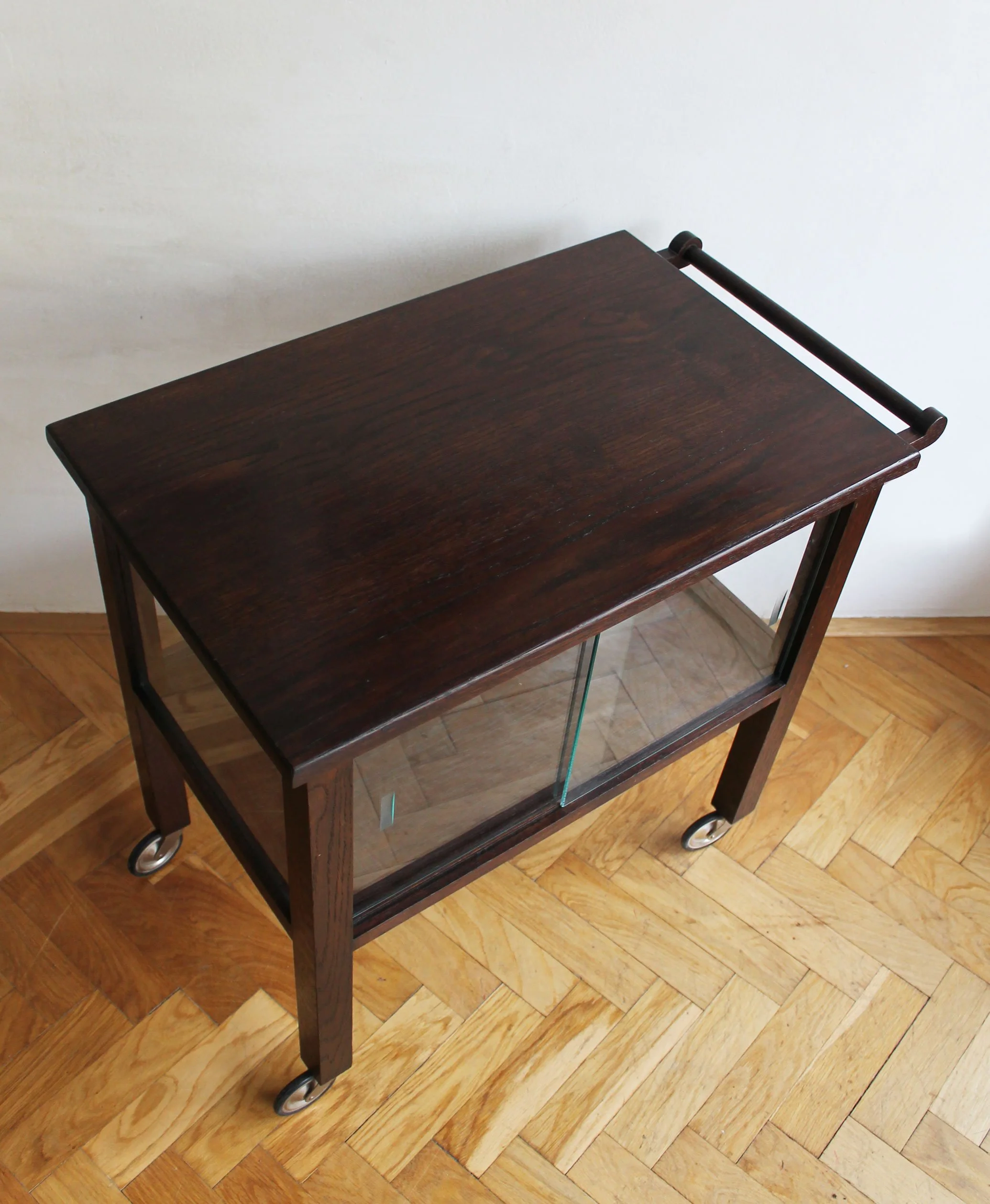 Minimalist design details of wood and glass combination in serving cart.jpg