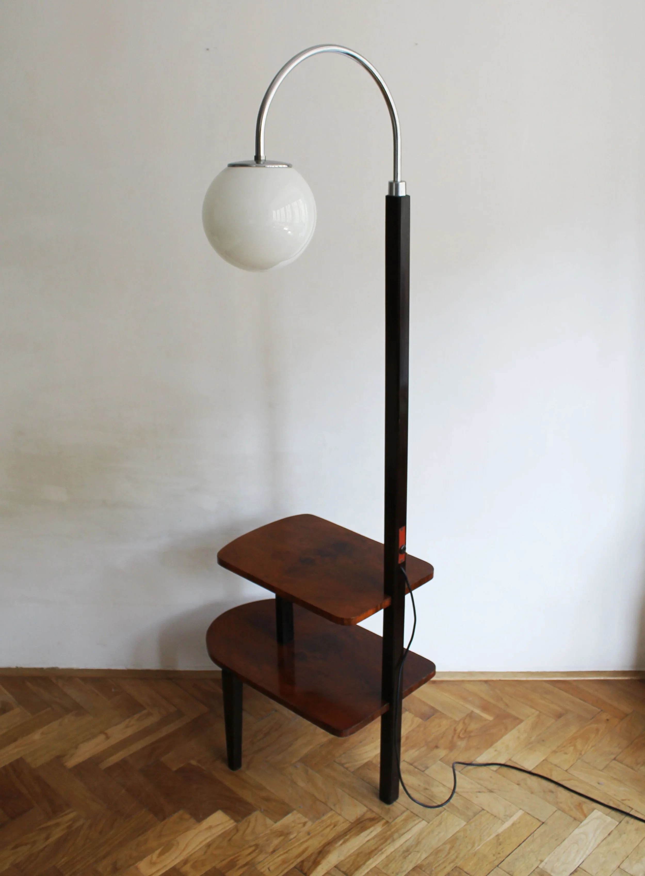 Czech modernist floor lamp with walnut veneer and dark beech shelves.jpg