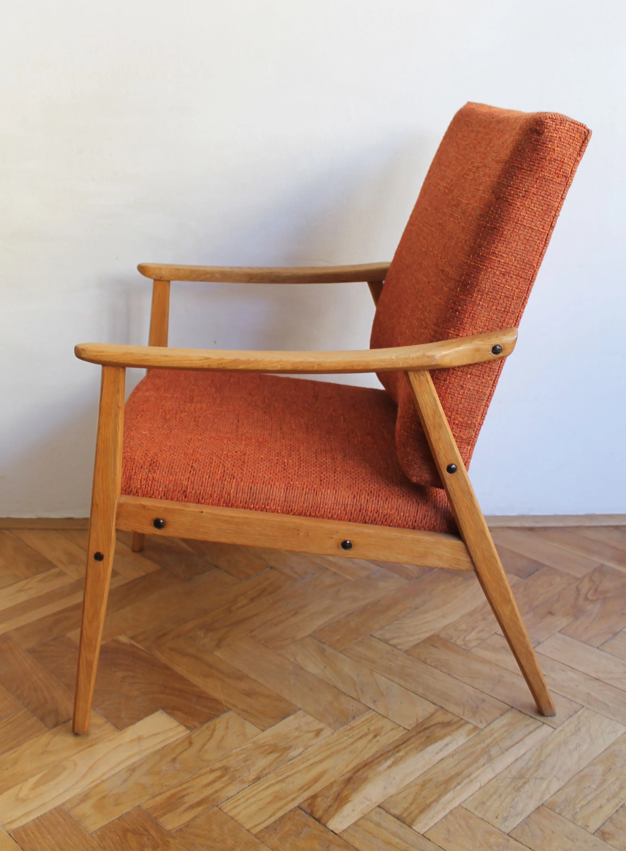 Vintage Central European armchair showing ergonomic curved seat.jpg