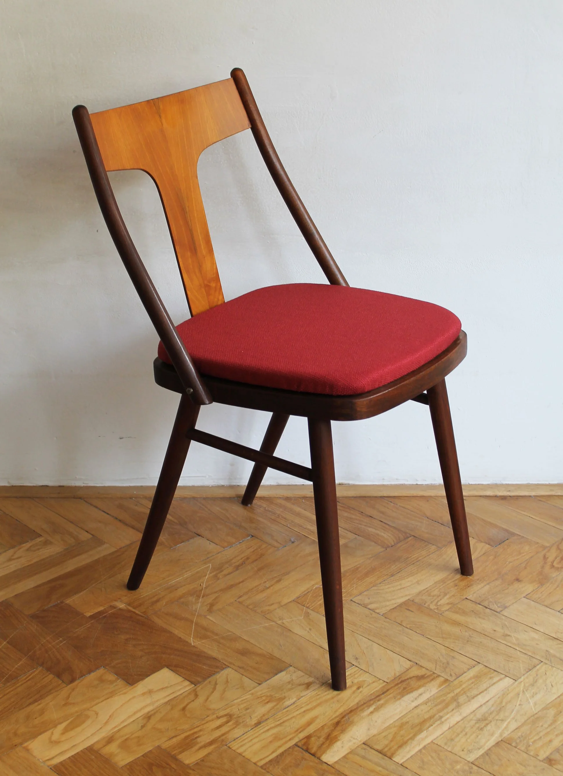 Vintage Scandinavian-inspired dining chairs with bentwood backrests.jpg