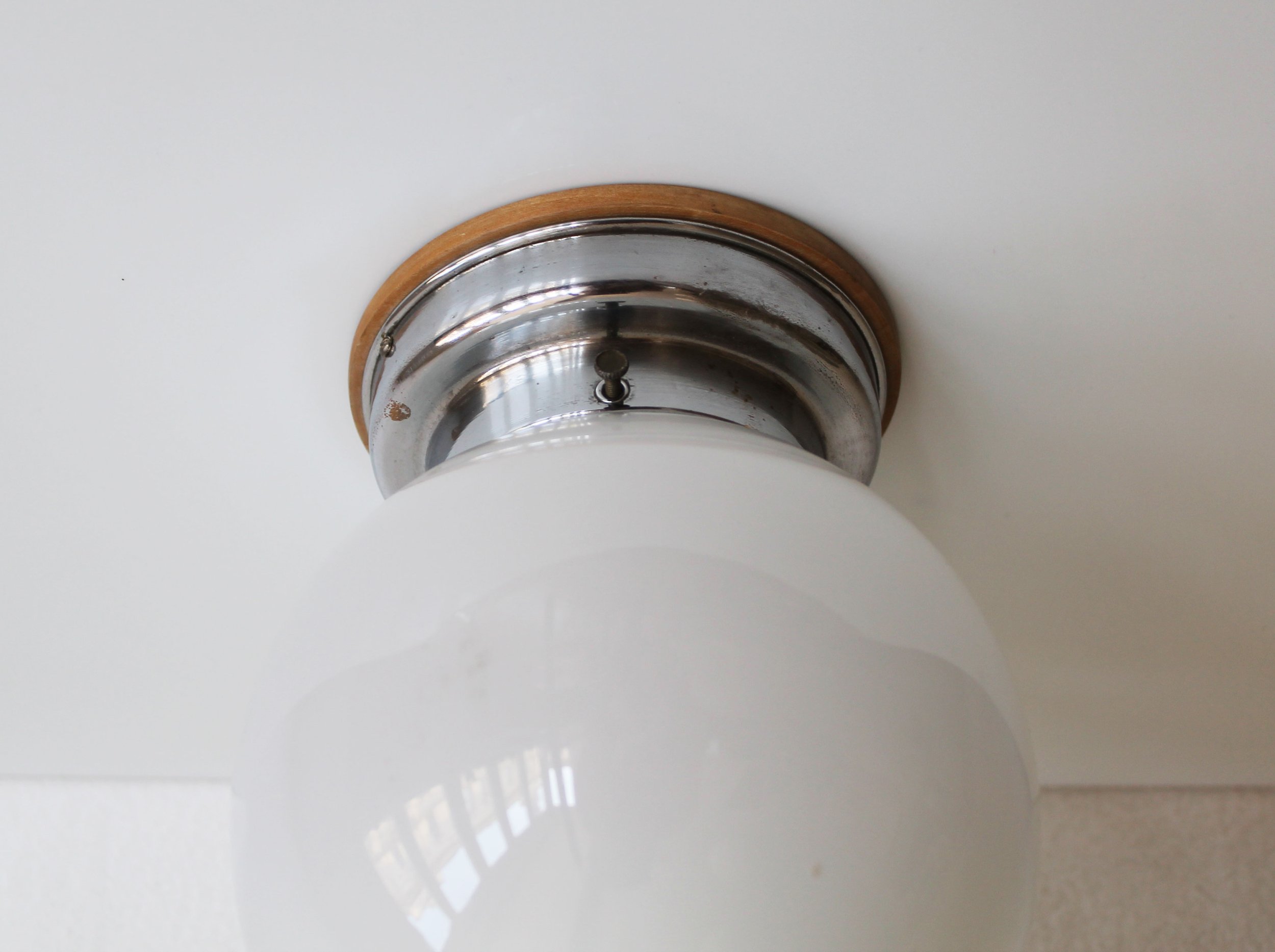 Pair of interwar modernist lights mounted on wall.jpg