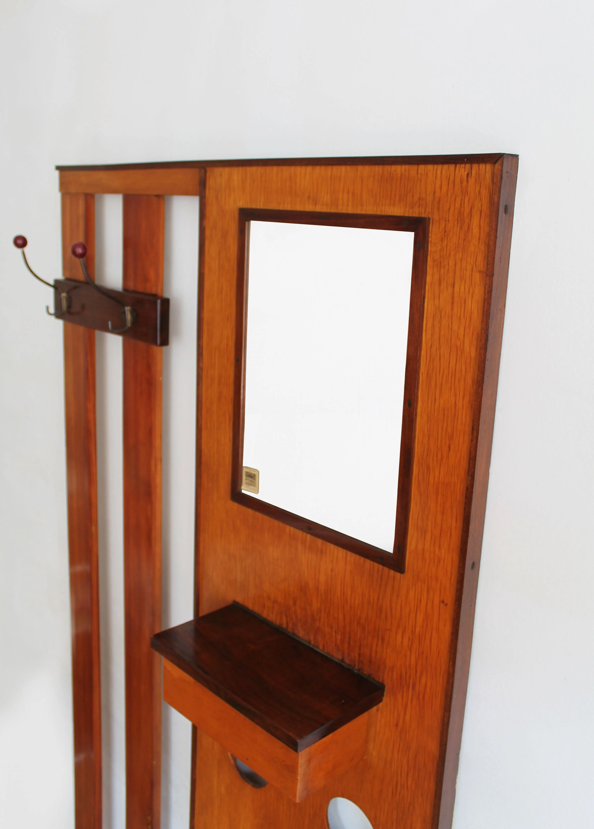 Vintage wooden wardrobe accessory: mirror, hooks, key storage, circular design.jpg (Copy)