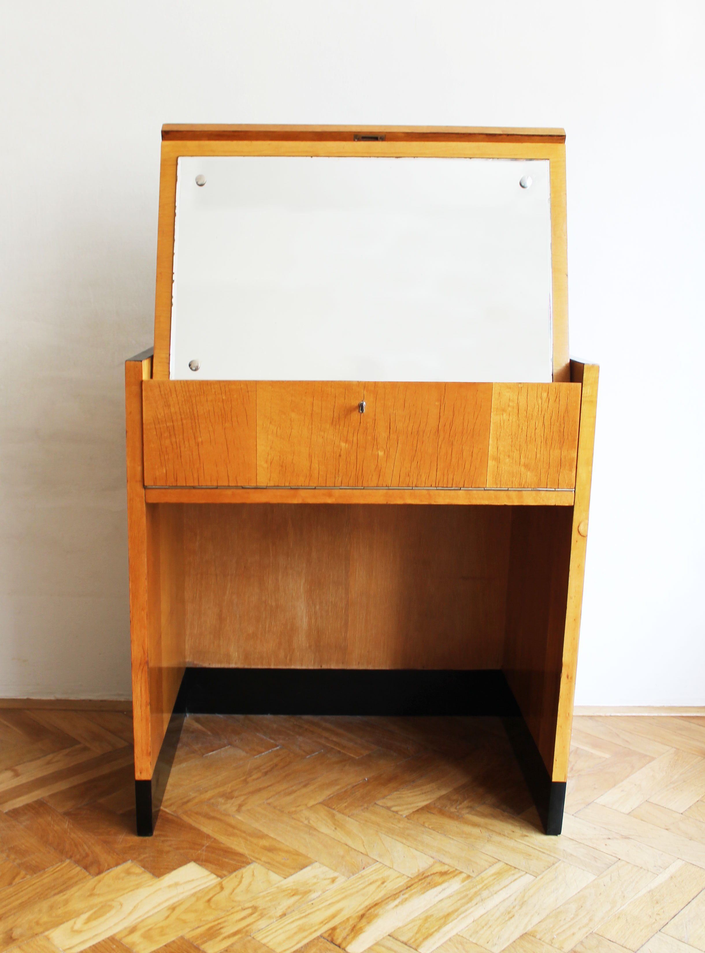 Vintage mid-century birch dressing table with mirror adjustment system exposed.