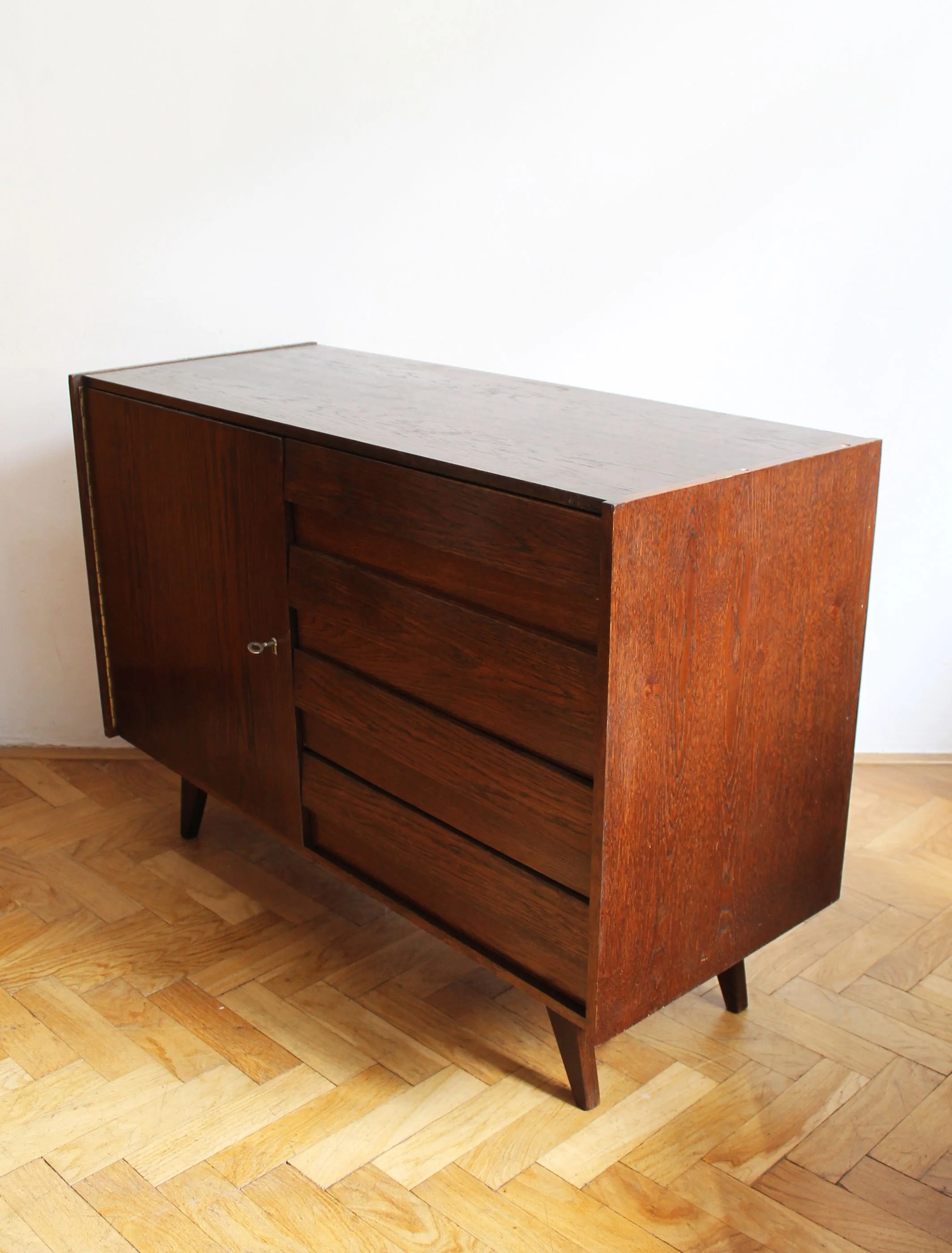 Close-up of original wood finish on 1970s Czech modernist furniture.jpg