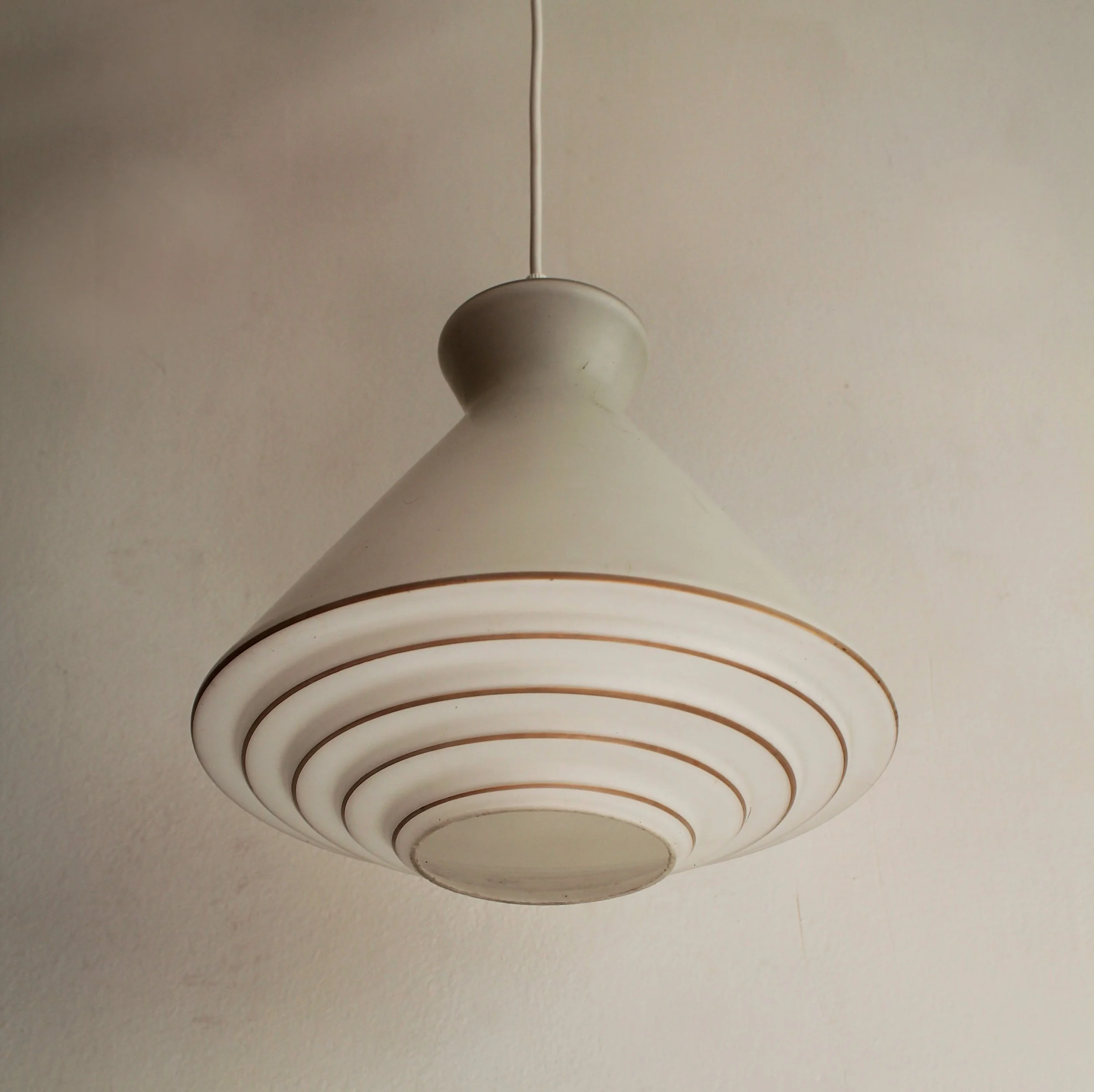 Czech 1960s pendant light with conical milk glass form.jpg