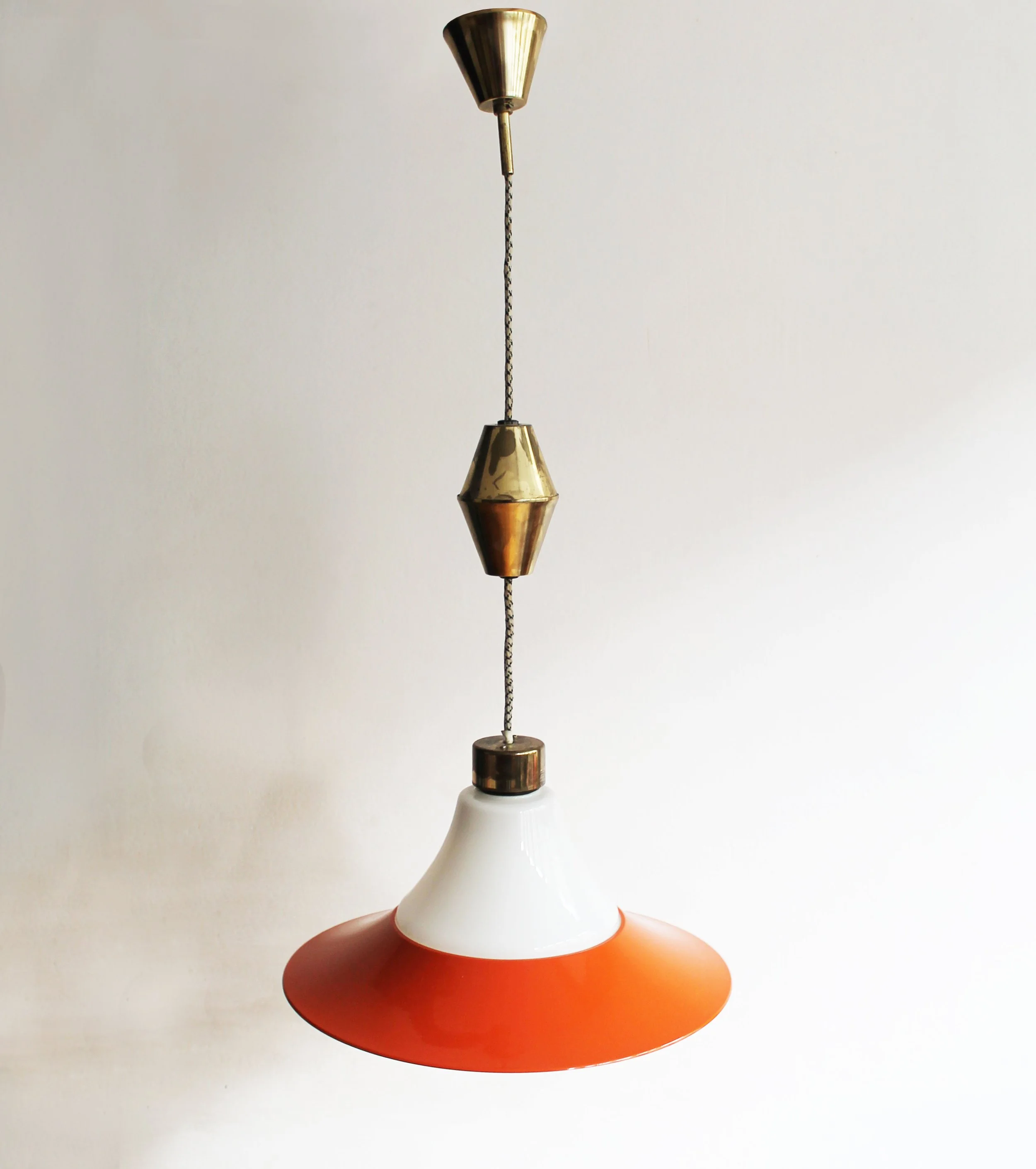 Collectible 1960s Czechoslovakian pendant lighting with brass accents.jpg