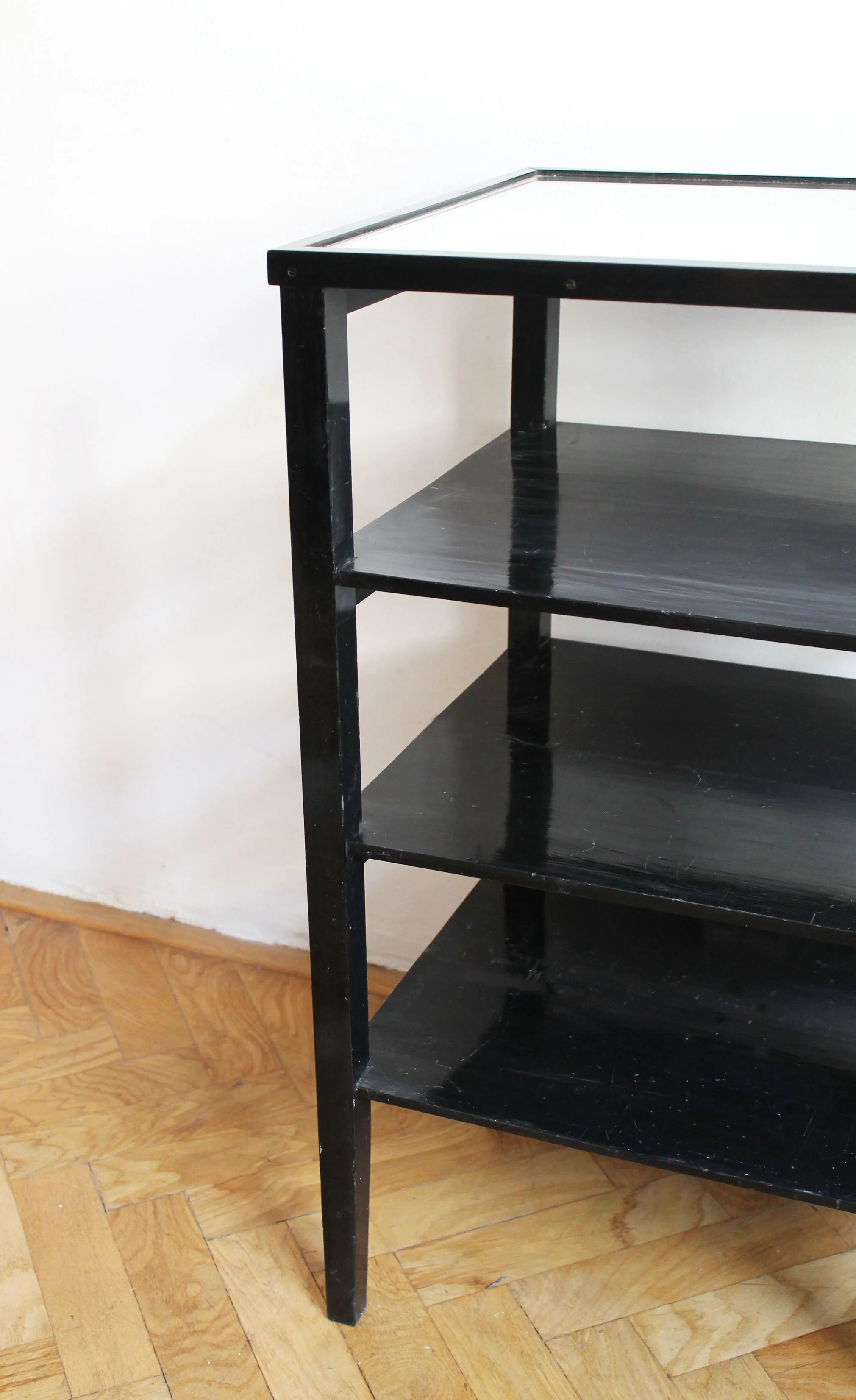 Detail of black-painted timber frame and shelves on a 1940s Czechoslovak Modernist étagère.jpg