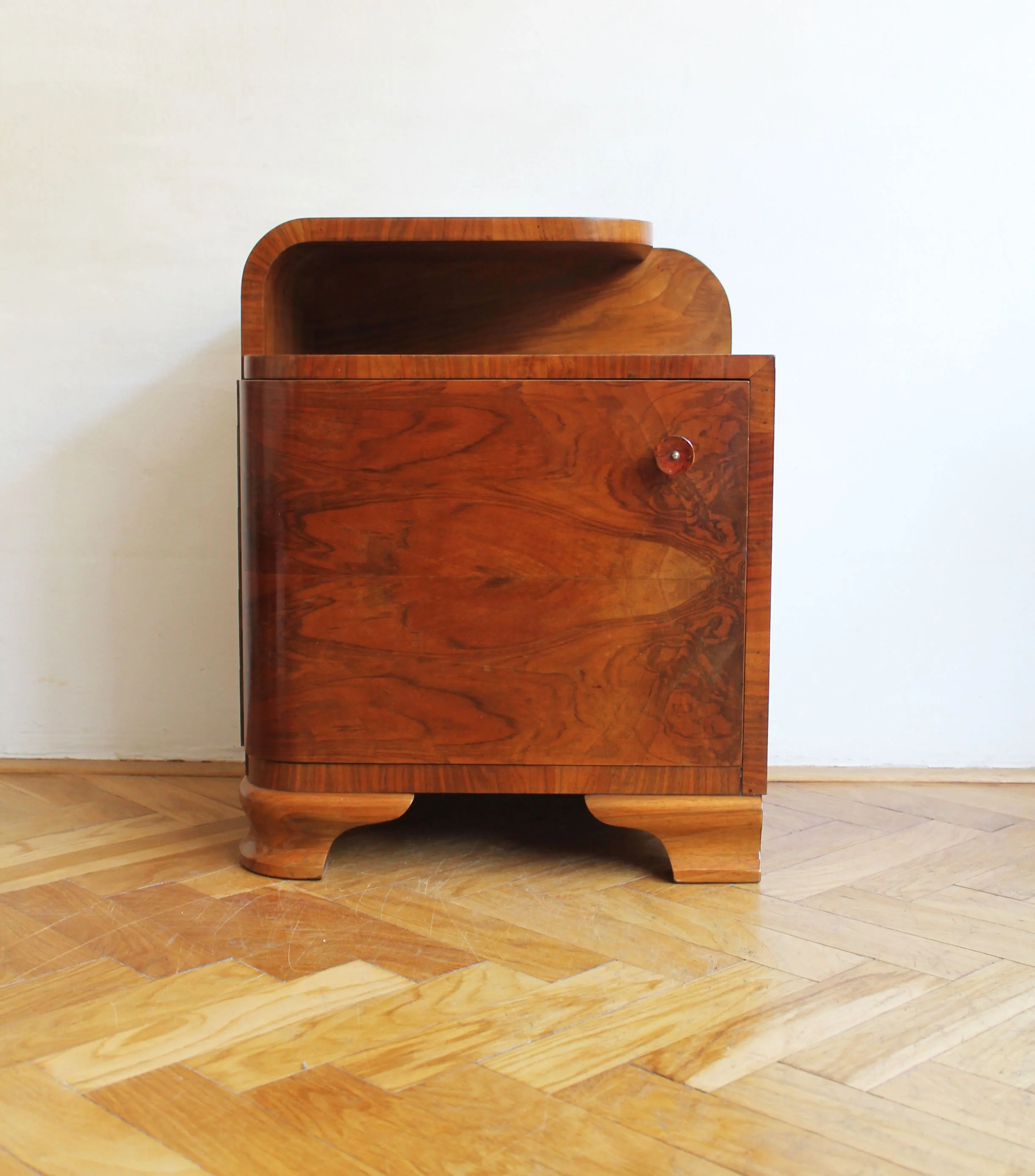 1930s modernist bedside table asymmetrical curved edge.jpg