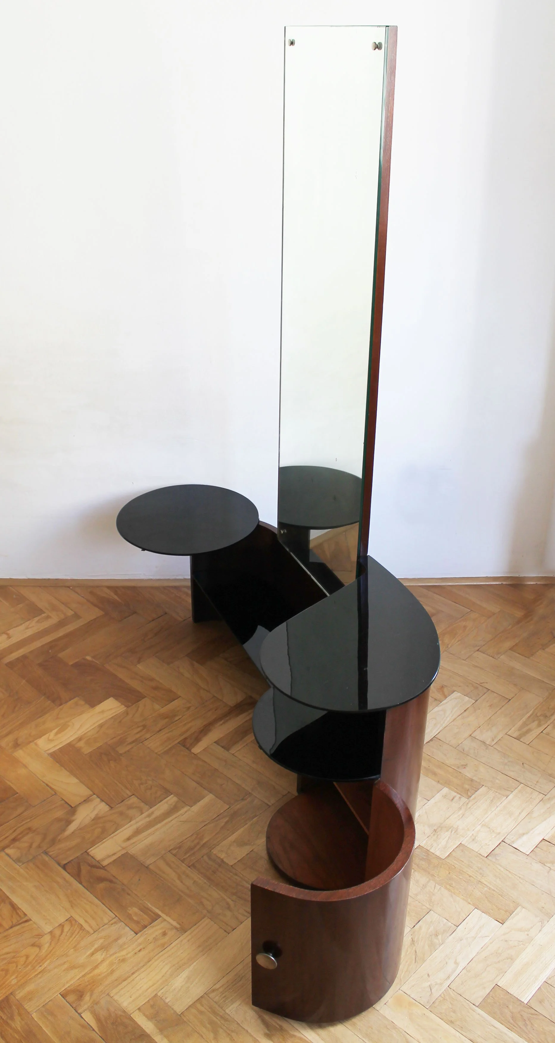 Top-down perspective emphasizing the horizontal shelf connecting the two sides of the dressing table.jpg