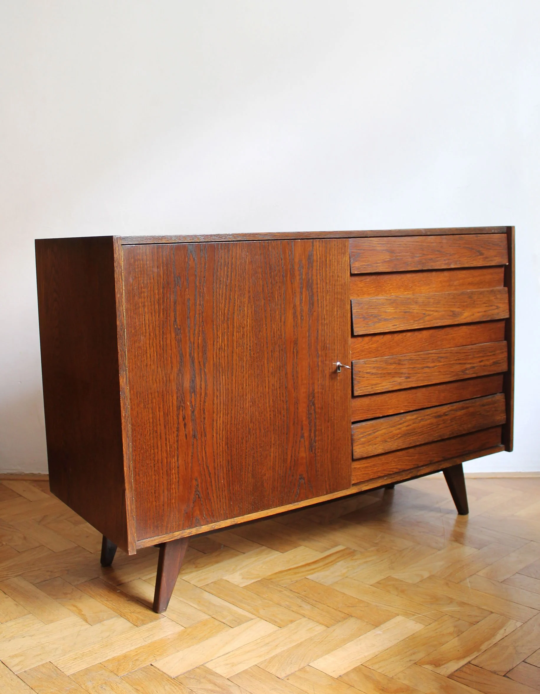 Close-up of oak drawer fronts on Czechoslovak Mid-Century sideboard.jpg