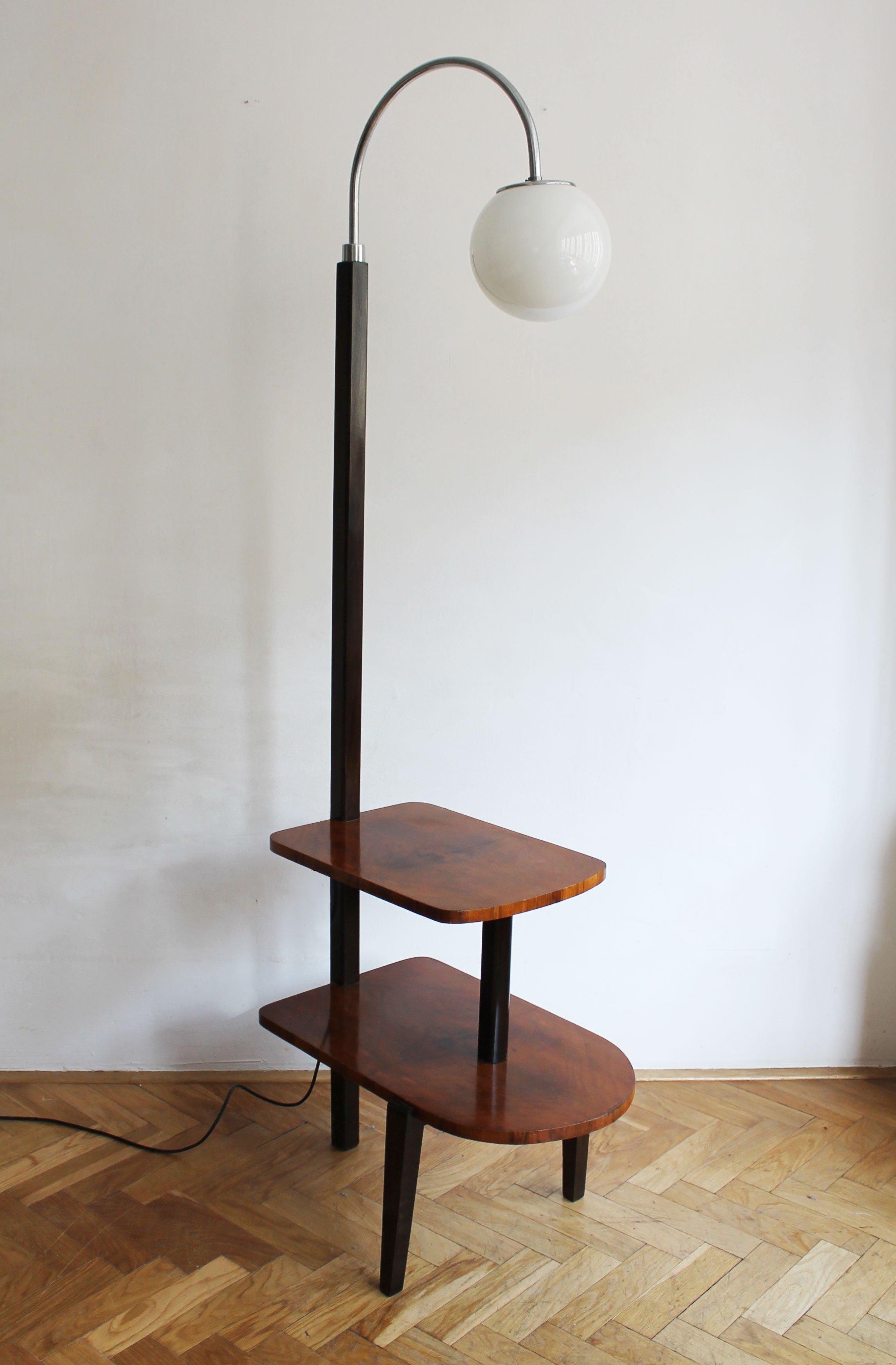 Mid century reading lamp with integrated shelves and spherical glass shade.jpg