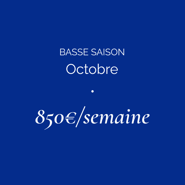 Blue background with white text displaying 'BASSE SAISON Octobre 850€/semaine'.