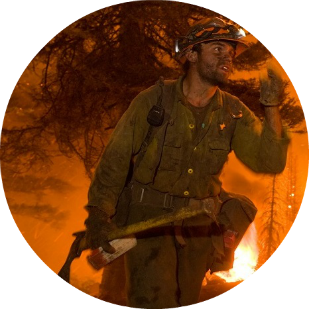 Firefighter in wildfire, by USDA, cc. C2.png
