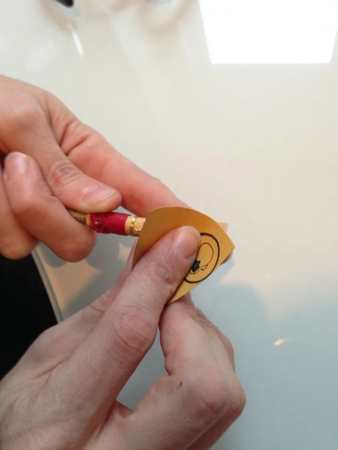 Sanding the blade