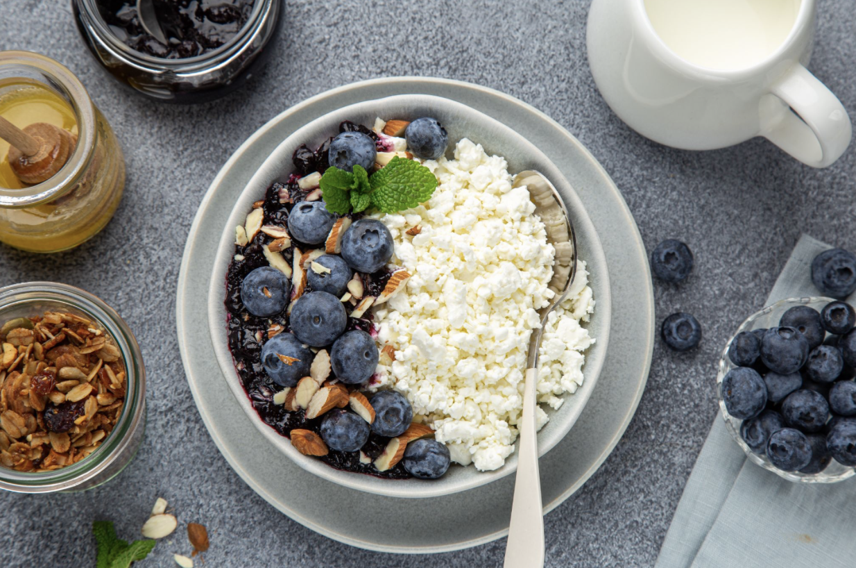 healthy and protein-rich bowl with cottage cheese and berries
