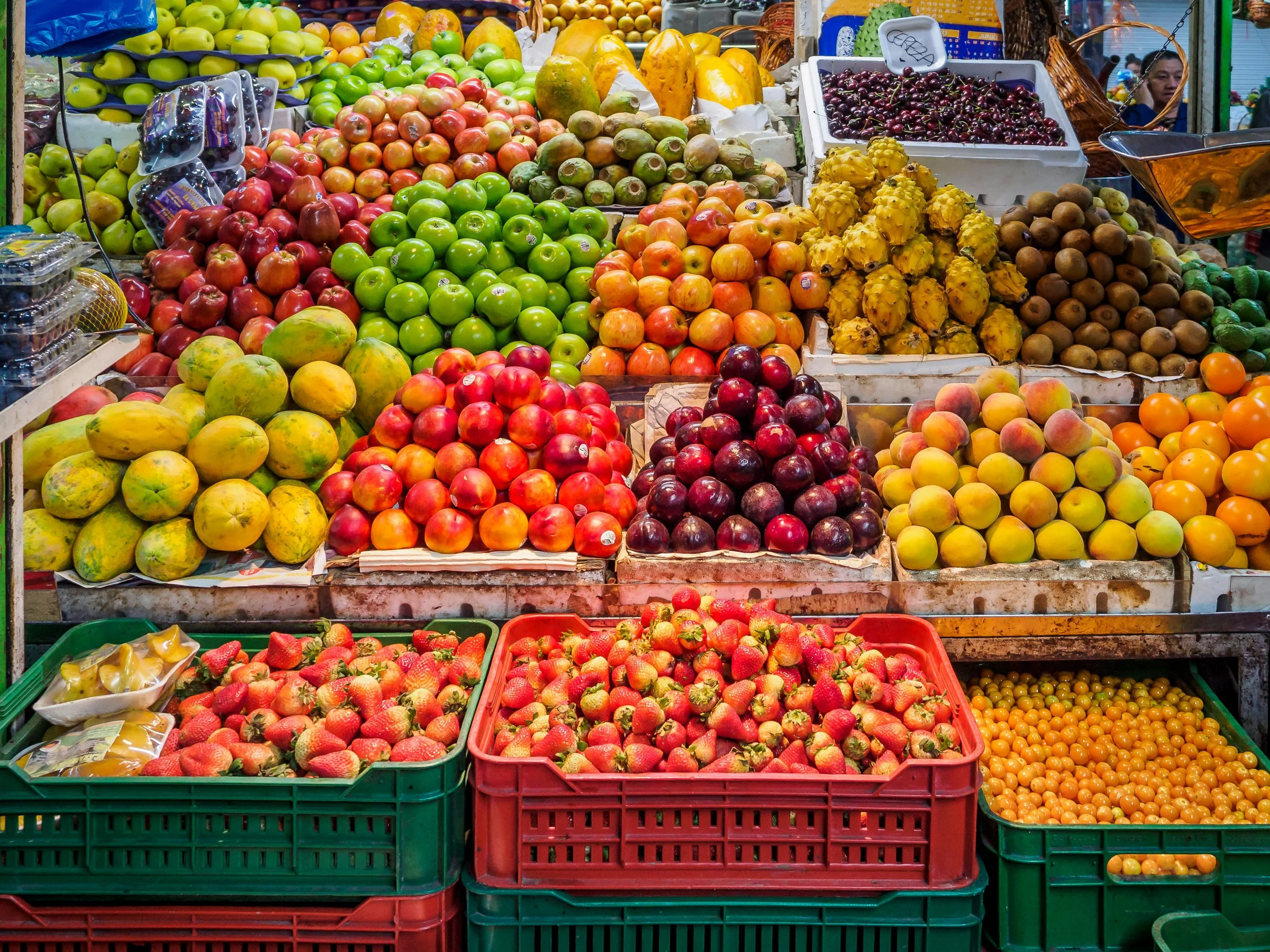 an open market with fresh fruit