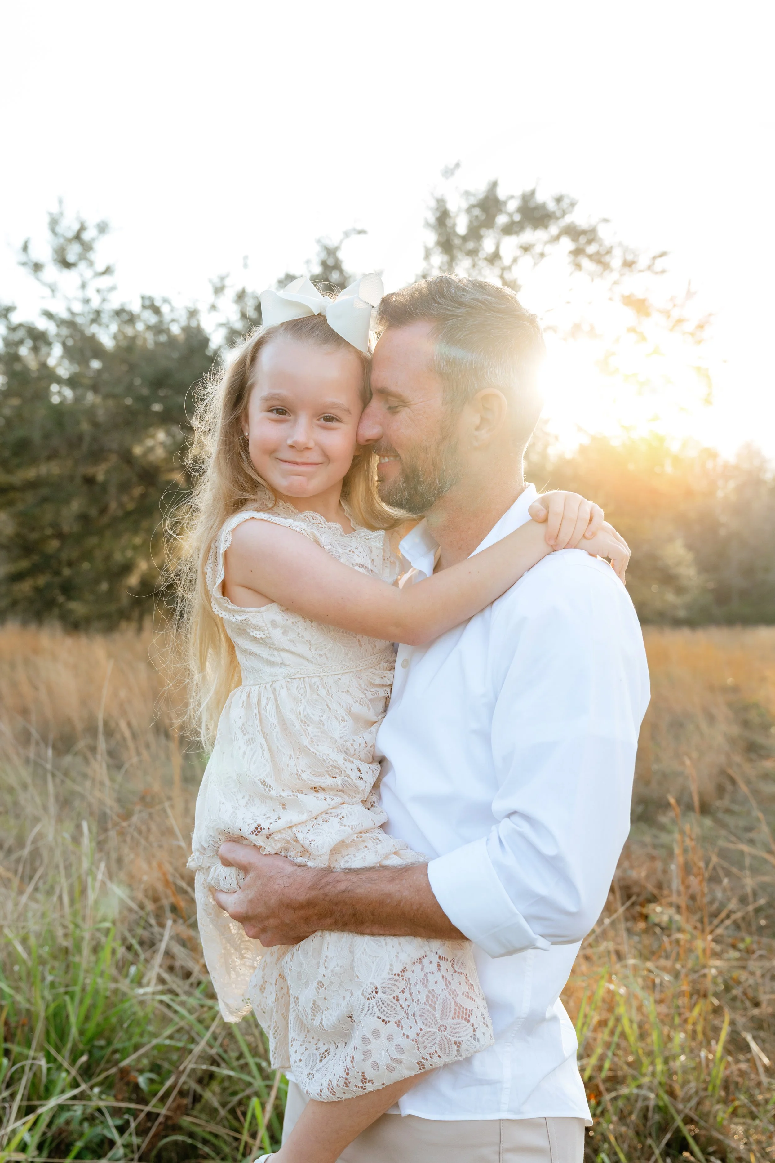 dad and daughter during professional family photo session near tampa florida