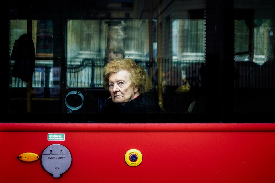 Elderly lady on bus