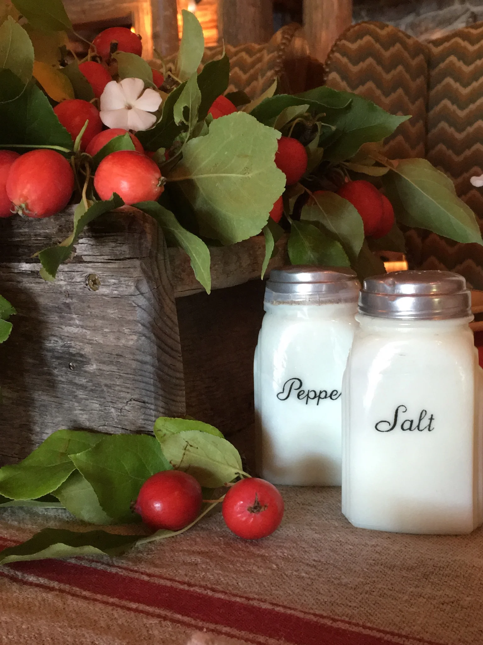 We used a rustic wood box built by our favorite local craftsman, Chris Pemberton filled with fresh crab apples from the trees in Jennifer's yard. We discovered that wiping the crab apples polished them for extra shine. Who knew it was possible to make a delightful crab apple even more gorgeous?