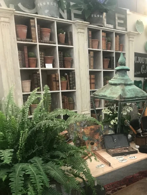 Antique book and rustic pots are a such a beautiful way to decorate a bookcase. We'll have both books and french terra cotta pots at Objet Trouvé.