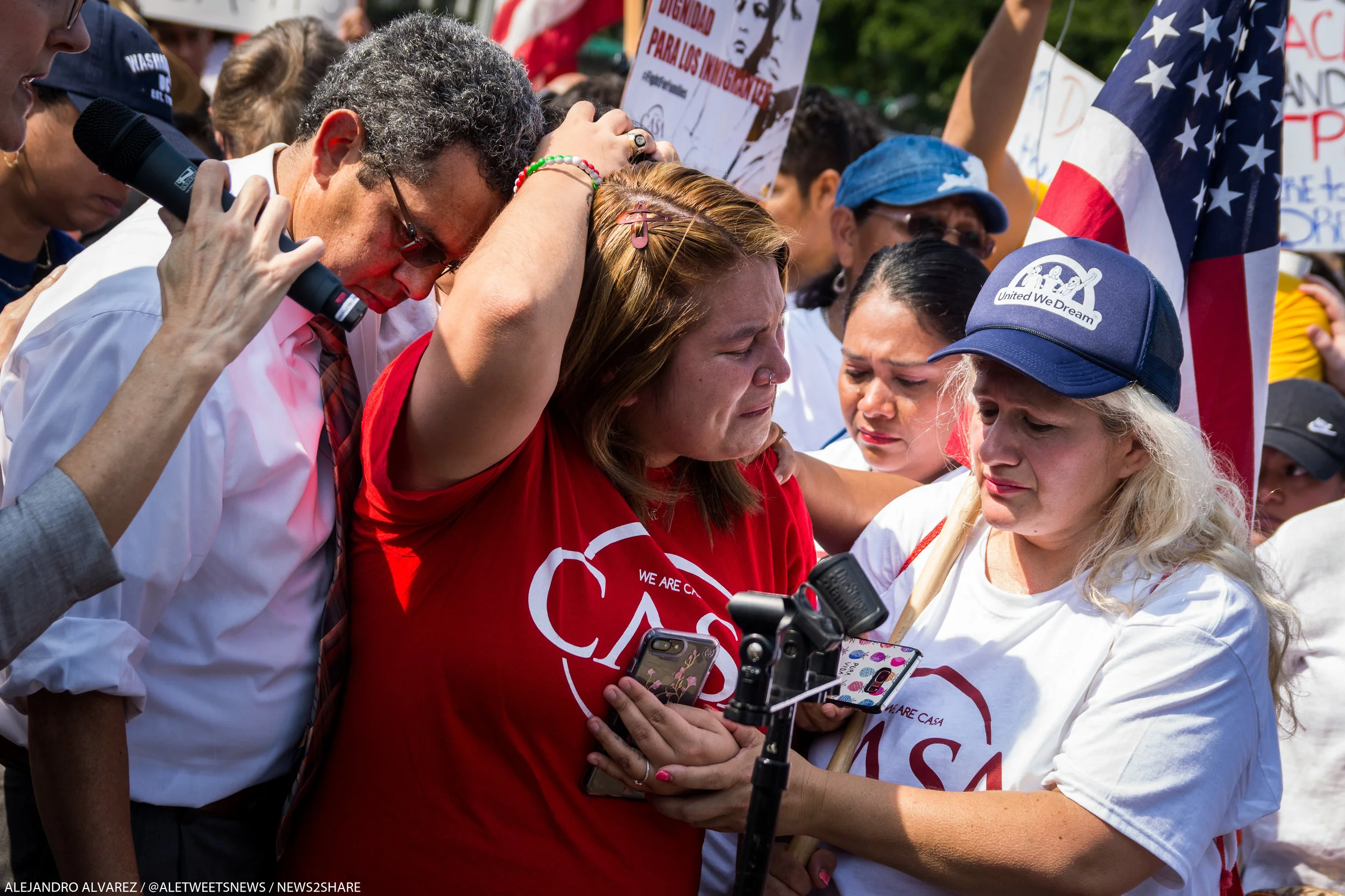Dreamers react to news of Trump's planned cancellation of DACA at a White House protest on Tuesday.