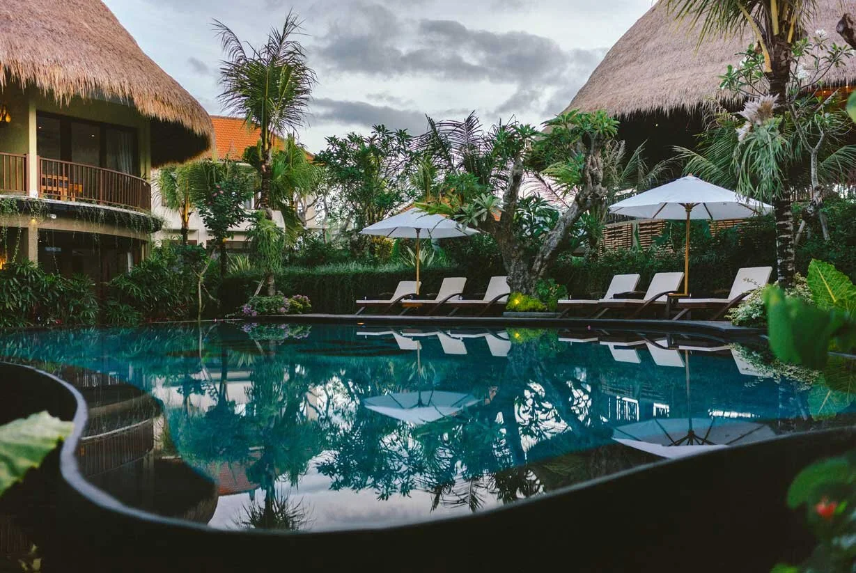 Join us as we Immerse into a week away in the spiritual heart of Bali. In August 2020 we travel to Ubud for a truly rejuvenating and soulful experience that will call you home to yourself and inspire you to rest, replenish and cultivate the most ideal space for you to be, reflect, reconnect and rediscover your joy! We’ll spend a week at the idyllic Honai Wellness Resort, our own private paradise, just on the outskirts of Ubud and set amidst lush tropical gardens. Here you will feel so nourished and supported in your practices of radical self care as you relax and indulge in uplifting, luxurious and blissful experiences. We endevour each and every day to consciously soak in the serene magic and culture this beautiful island is so steeped in, as we enjoy morning and afternoon yoga & meditation practices, within a stunning open air yoga pavilion, enjoy healthy & delicious local cuisine, indulge in pampering rituals, laze, journal, explore, lounge by the private infinity pool, and maybe sip a cocktail or two as the sun sets, surrounded by a groups of like minded yogis. The week is entirely yours and the impulse will be around reclaiming your whole self and affirming what is it to seek and embody your Bliss. Off the mat we will explore Bliss in nourishing and uplifting ways as we relax into the beauty, healing energy & nourishment that such a rich retreat ultimately brings to your body, mind & spirit. Each day will commence with a rejuvenating yoga practice followed by innate and instinctual meditations, where we will expand and develop our theme and practices throughout the duration of the retreat. Later in the afternoons, surrounded by the beauty & sounds of nature, you will experience the complete nurture of yin and restorative yoga to nourish and rejuvenate. On other days you will be led by Alison Potts in one of her afternoon workshops which will focus on the magic of intuitive meditation and sacred practices to listen to your own soul and body *and empower and incorporate those voices as your own. We will learn the thrilling skill of tuning into our intuitive wisdom and extra-sensory perception as well as the vital art of healing anything that is getting in the way of your self-love and self-worth. Whilst there will be plenty of yoga & meditation on the retreat, the schedule is tailored to your individual needs so there will be plenty of space to just be, to melt away the daily stresses of modern life, to luxuriate, pamper, shop, tune-in, rest and simply do as you please. We can’t wait to share in this very special time away. You know you deserve it! I N C L U S I O N S : * 6 nights in either single or twin share accomodation, with own private ensuite and balcony at the stunning Honai resort, * Morning and afternoon yoga and meditation practices * Daily healthy and nourishing buffet breakfast * 2 x afternoon ‘Innate Being’ workshops led by Alison Potts * Welcome dinner * 2 x balinese massage experiences with highly trained therapists in beautiful Ayurvedic spas. * 3 additional dinners (1 in-resort and 2 out at Ubud's finest restaurants) * Sound healing afternoon at Pyramids of Chi * use of yoga mat and props for the duration of the retreat * Airport transfers from Denpasar airport to Ubud * Please note, airfares , return airport transfers and transport within Ubud are not included in the price P R I C I N G Twin or double share deluxe : $1990 per person Single occupancy deluxe in king bed : $2495 * each beautiful air conditioned room has its own balcony, private ensuite with large bath tub, mini bar, filtered water and tea and coffee making facilities. email amy@innablissyoga.com.au for registration form.
