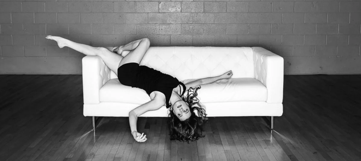 jenni+hanging+off+couch+3+by+5.5+higher+res+1 copy.jpg